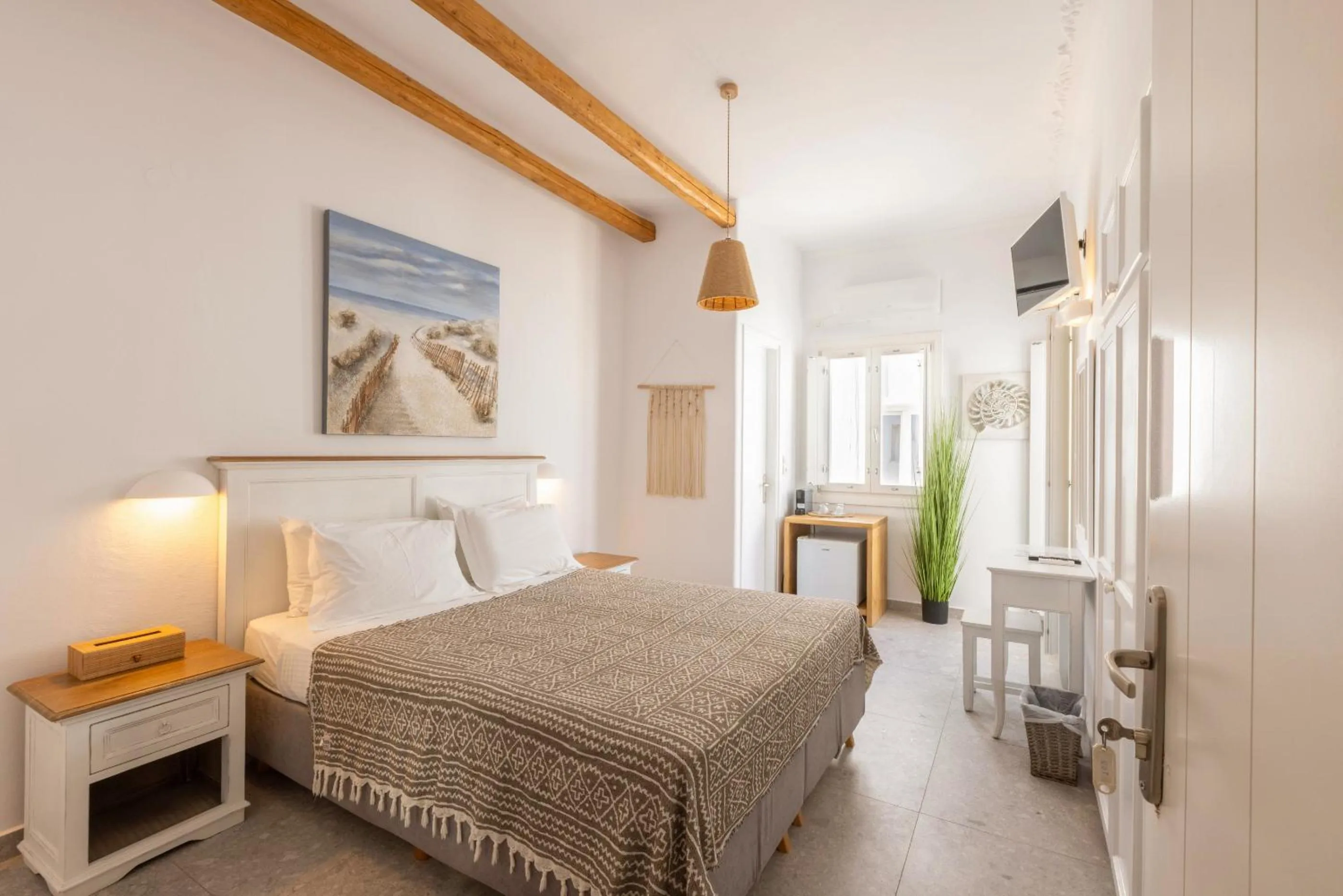 Bed in Parosquare Central Suites