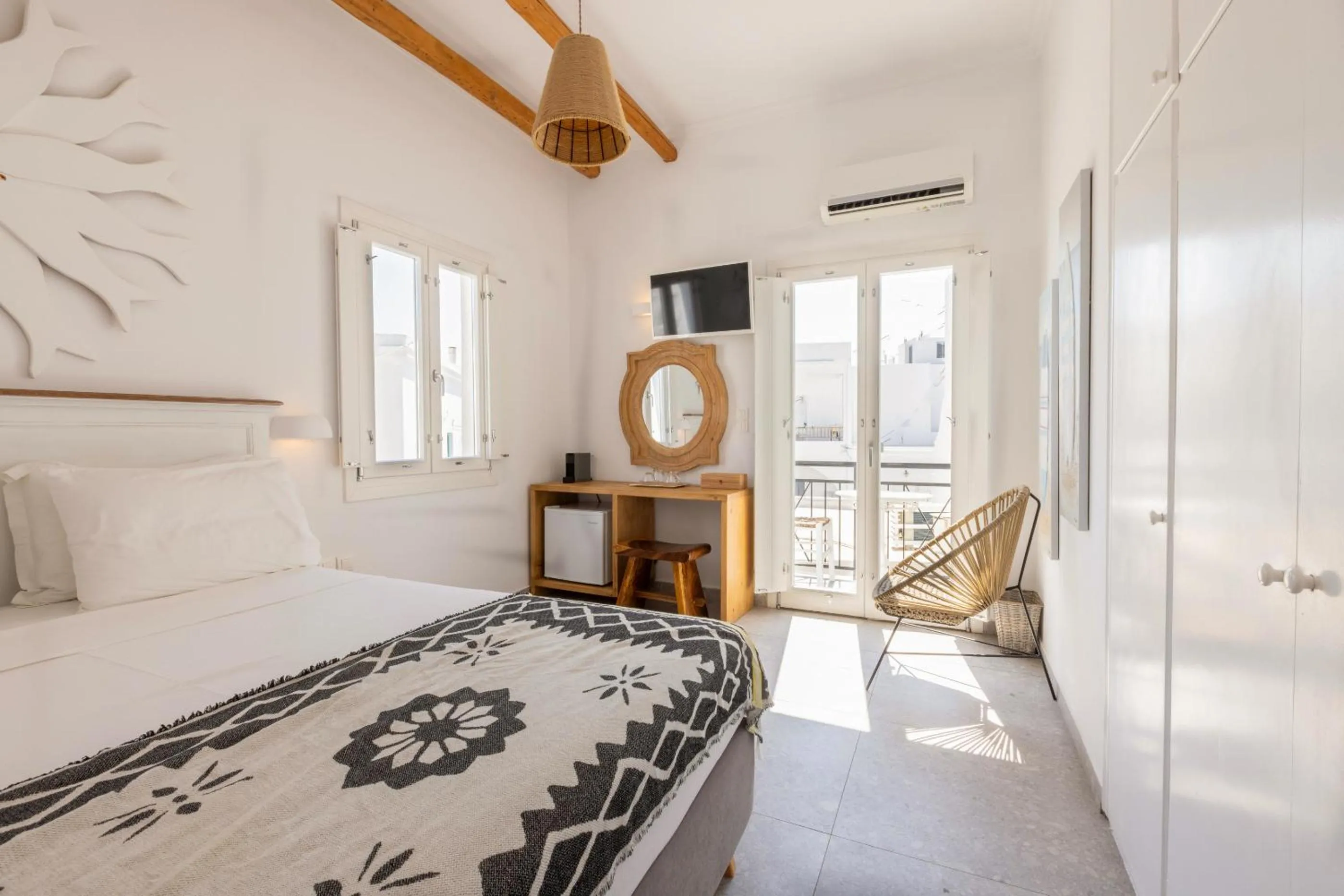 Bed in Parosquare Central Suites