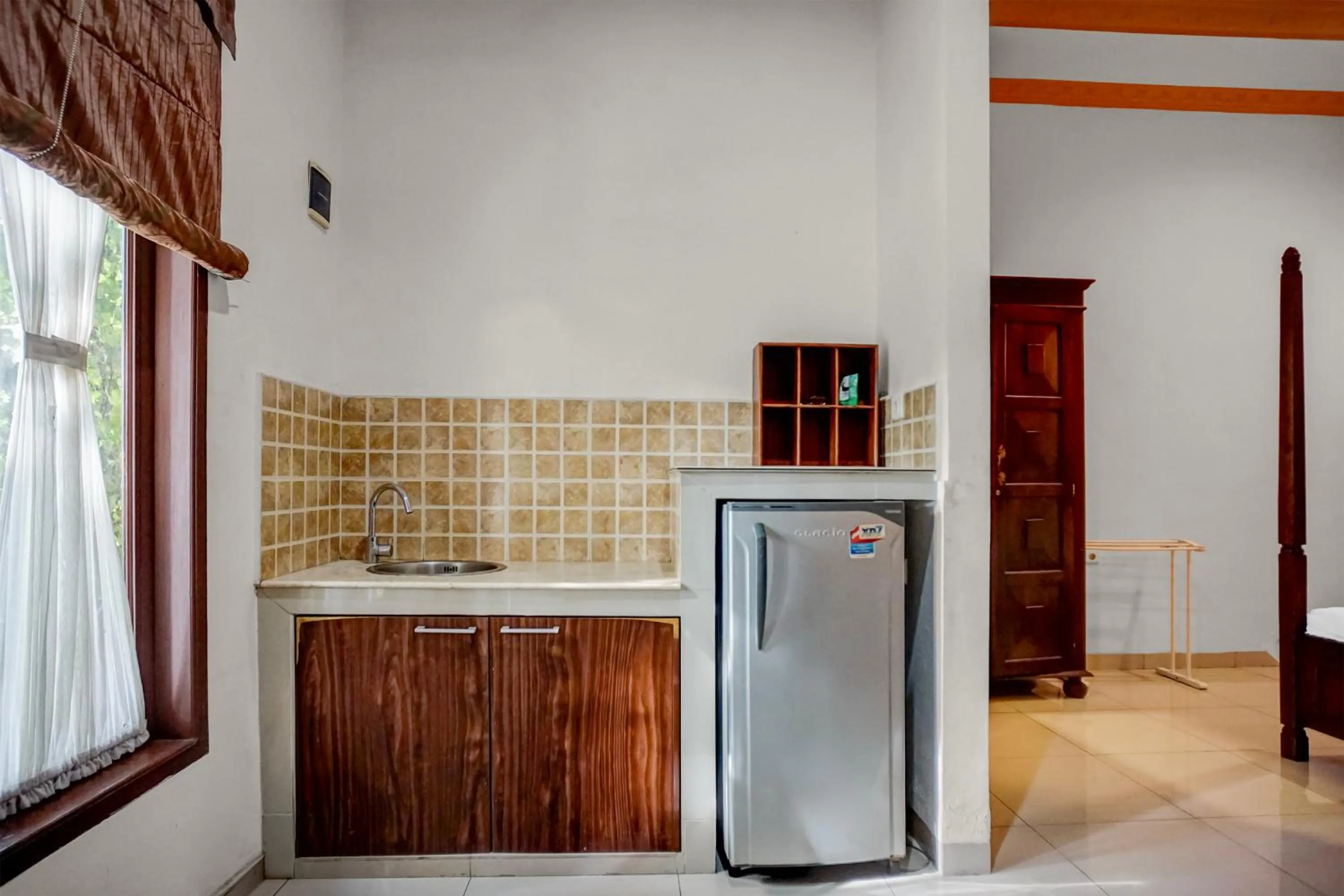 Kitchen or kitchenette in Collection O near University of Sumatera Utara formerly Huber Apartment