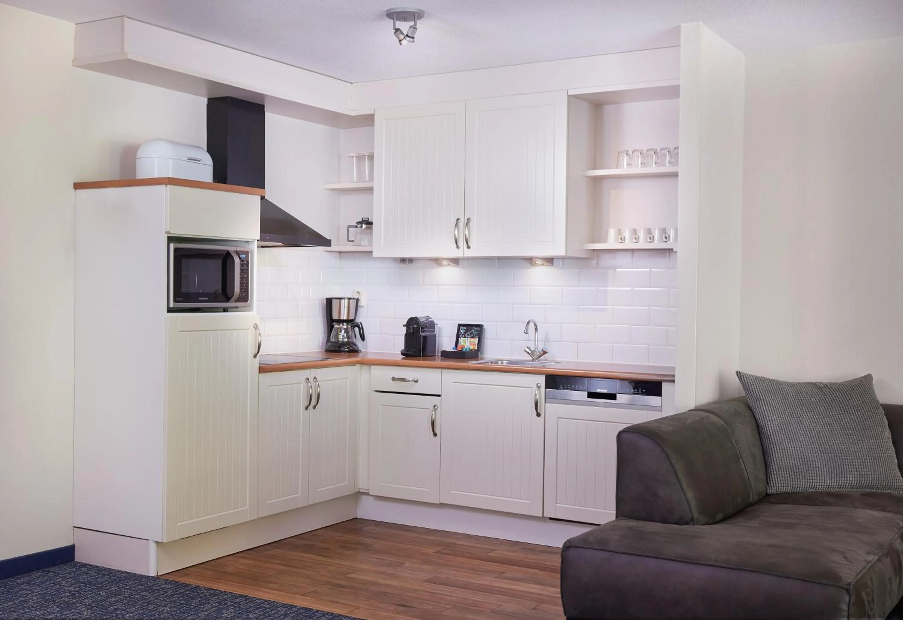 Kitchen or kitchenette in WestCord ApartHotel Boschrijck