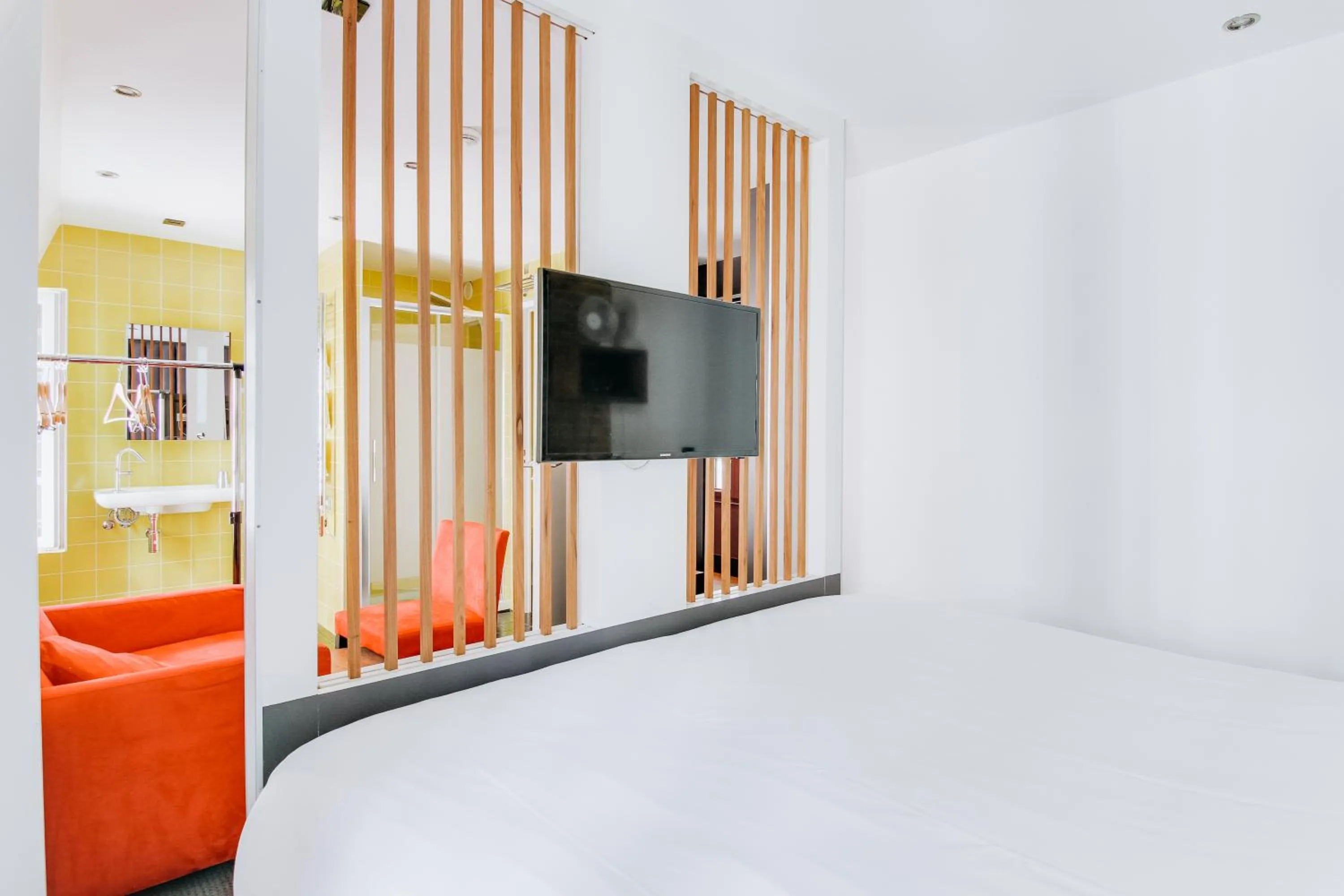 Bed in Hôtel du Jeu de Paume