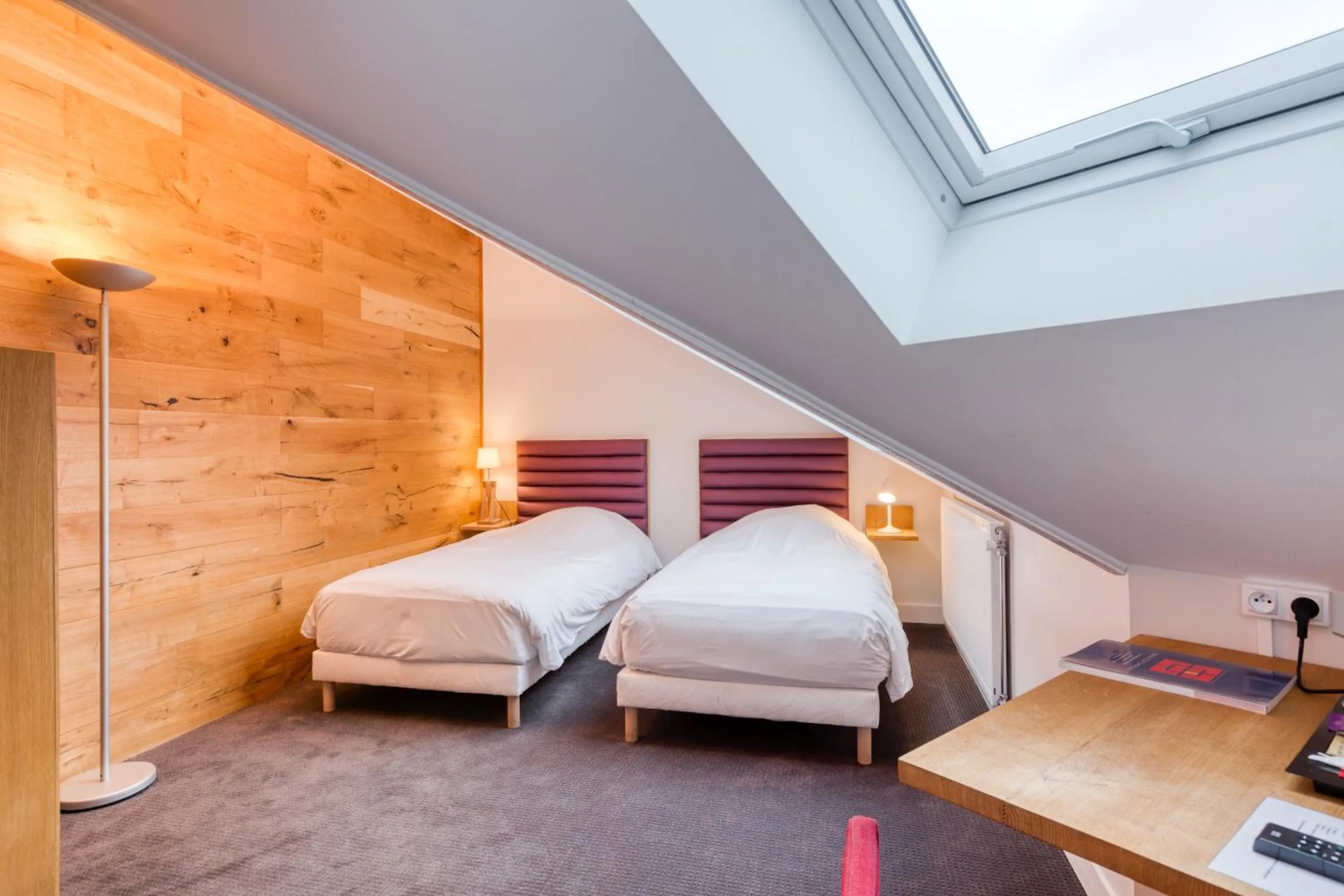 Bed in Hôtel du Jeu de Paume