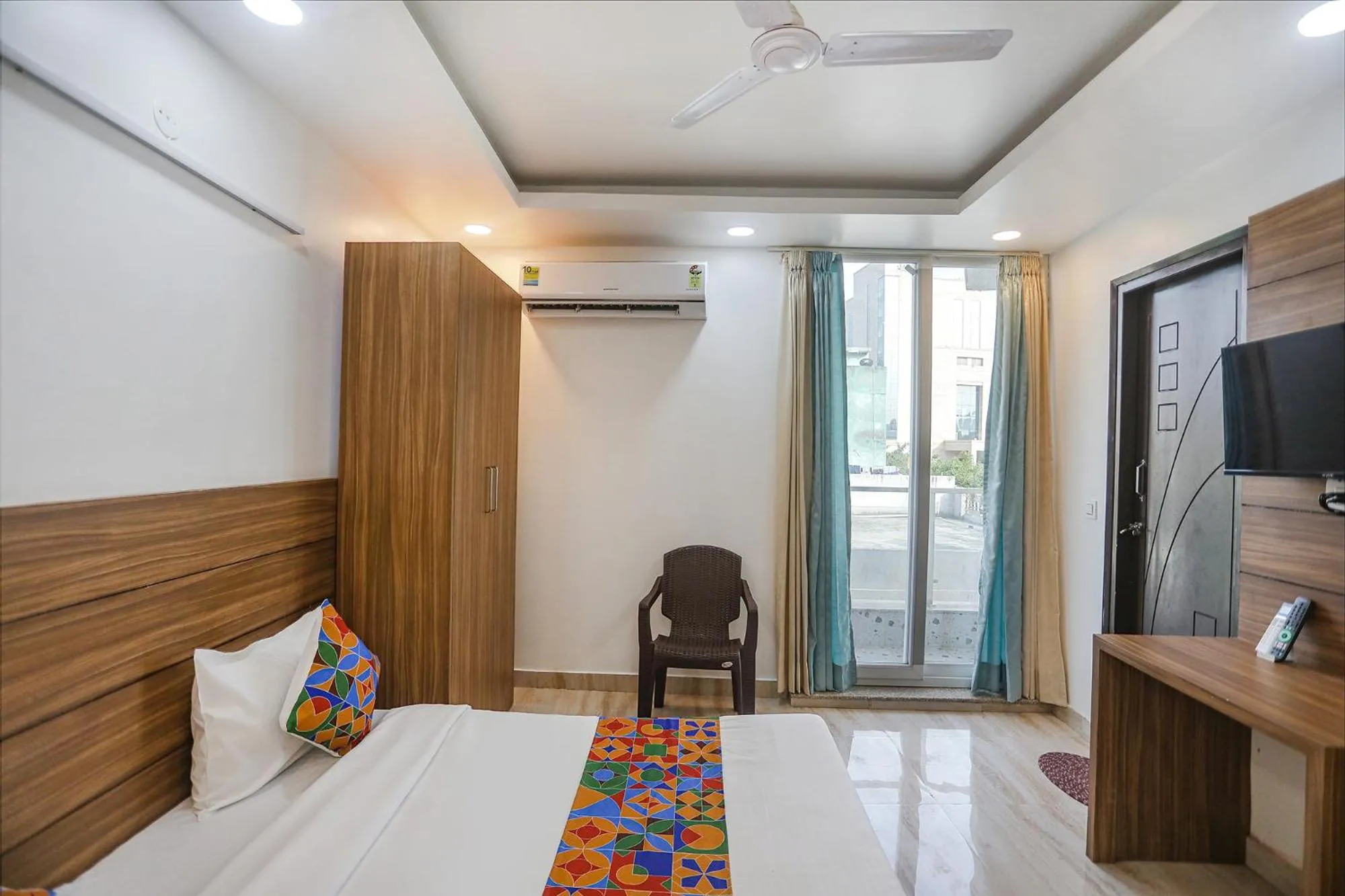 Bed in FabHotel Unique Stay