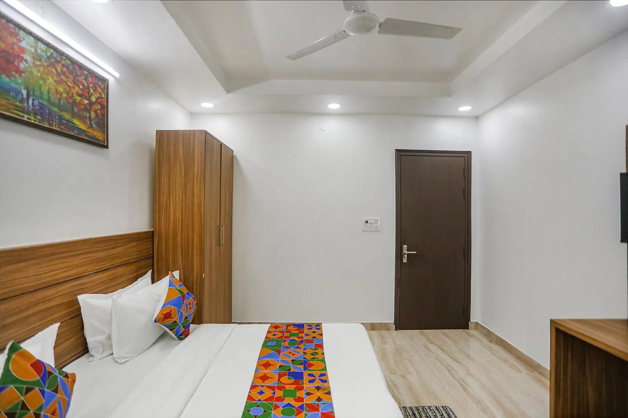 Bed in FabHotel Unique Stay