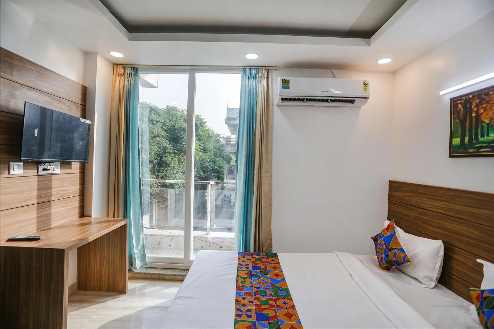 Bed in FabHotel Unique Stay