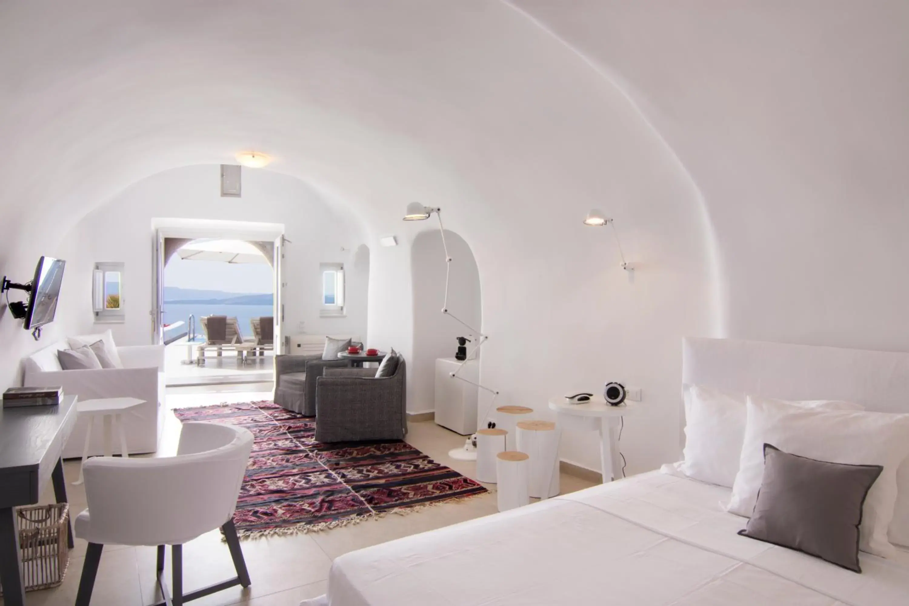 Photo of the whole room, Bed in Santorini Secret Suites & Spa, Small Luxury Hotels of the World Photo of the whole room, Bed in Santorini Secret Suites & Spa, Small Luxury Hotels of the World