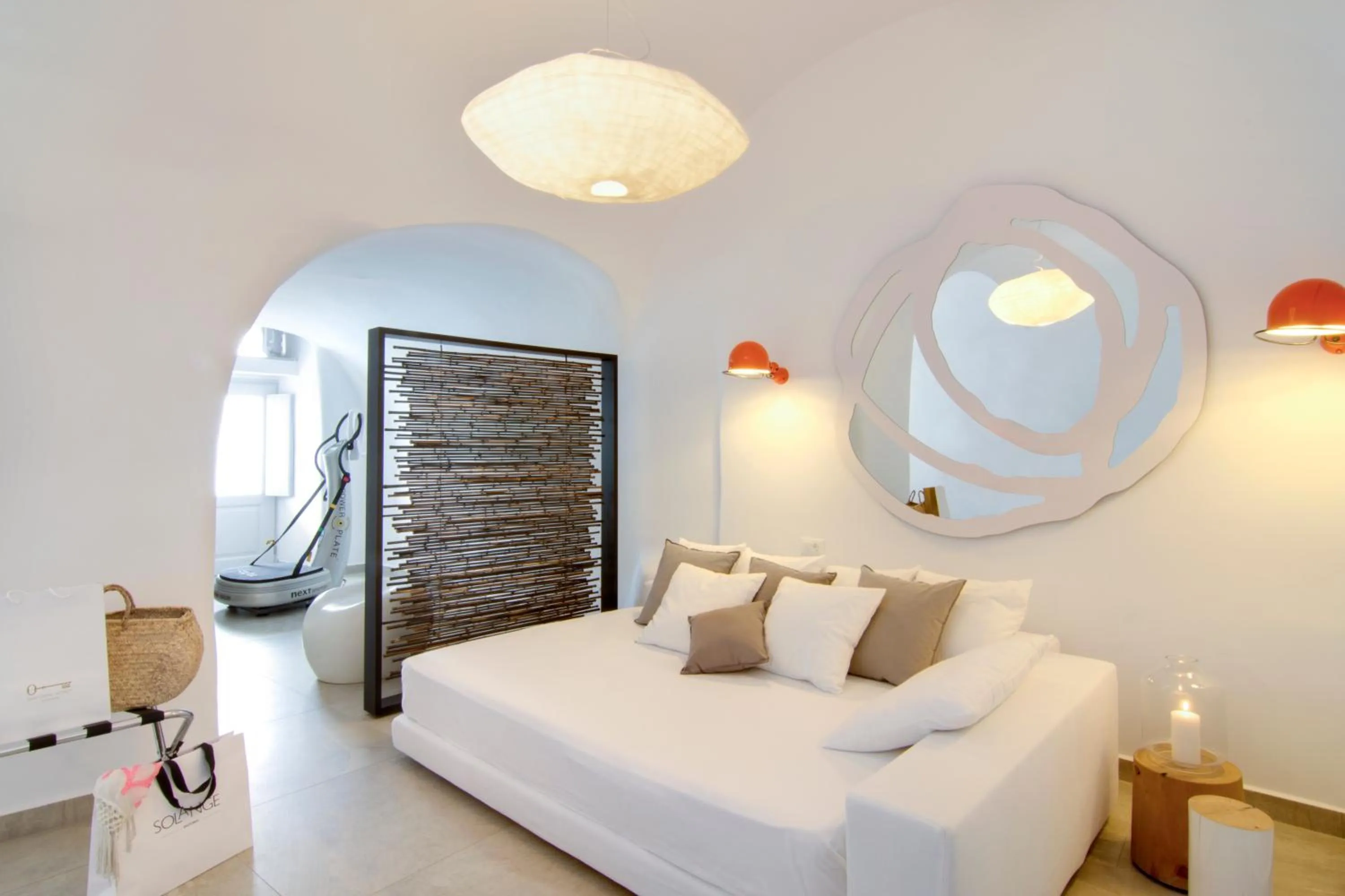 Seating area, Bed in Santorini Secret Suites & Spa, Small Luxury Hotels of the World