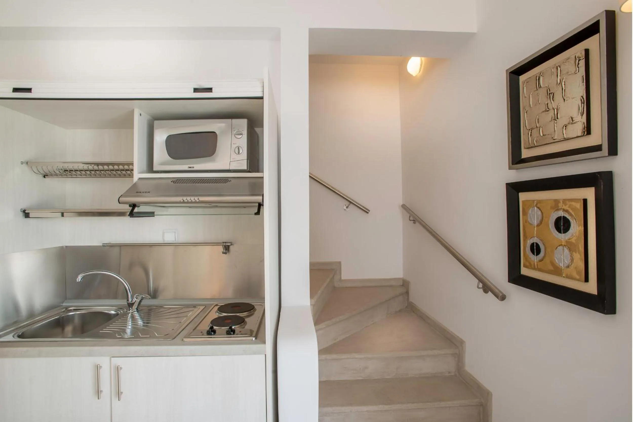 Kitchen or kitchenette in Santorini Secret Suites & Spa, Small Luxury Hotels of the World