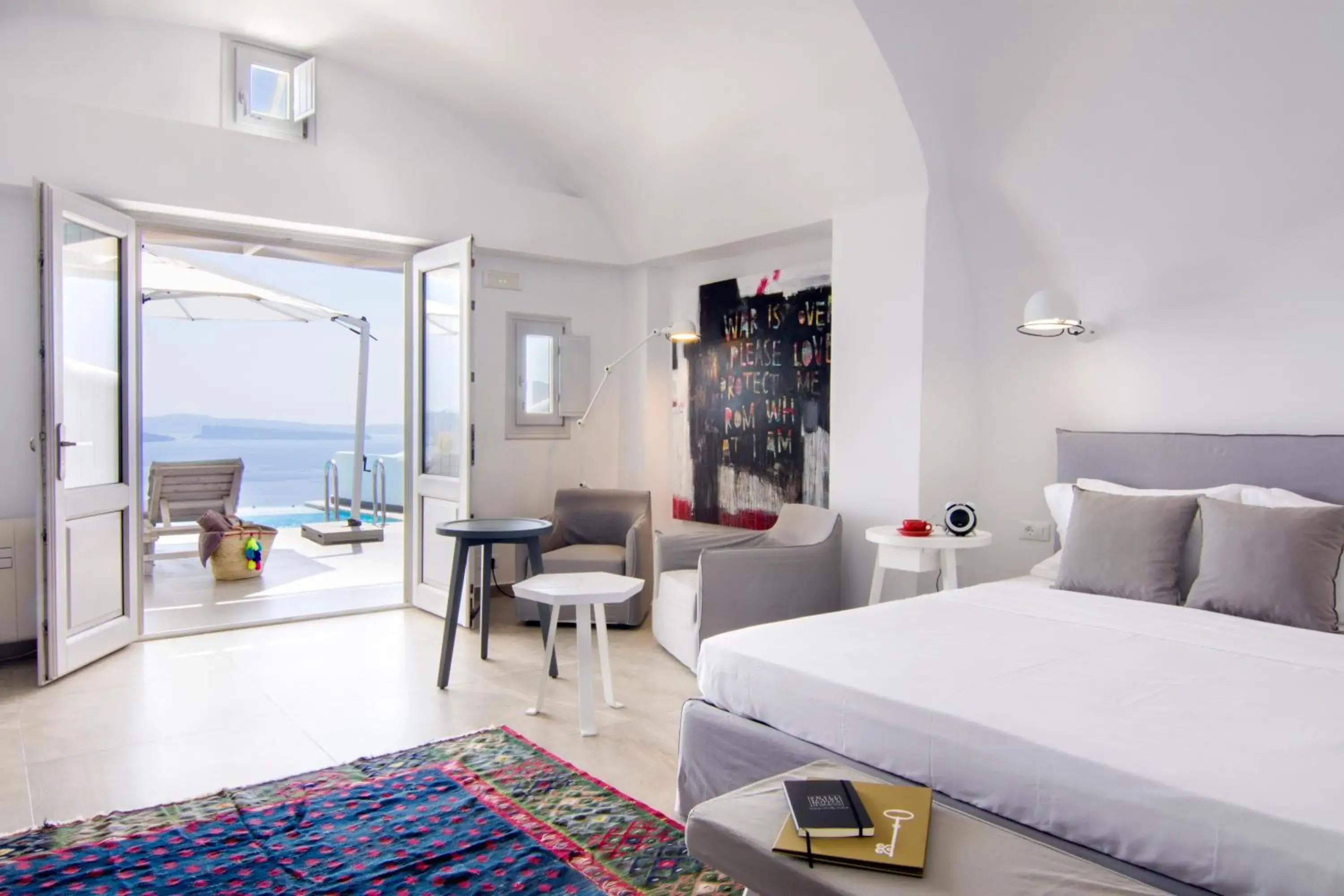 Photo of the whole room, Bed in Santorini Secret Suites & Spa, Small Luxury Hotels of the World Photo of the whole room, Bed in Santorini Secret Suites & Spa, Small Luxury Hotels of the World