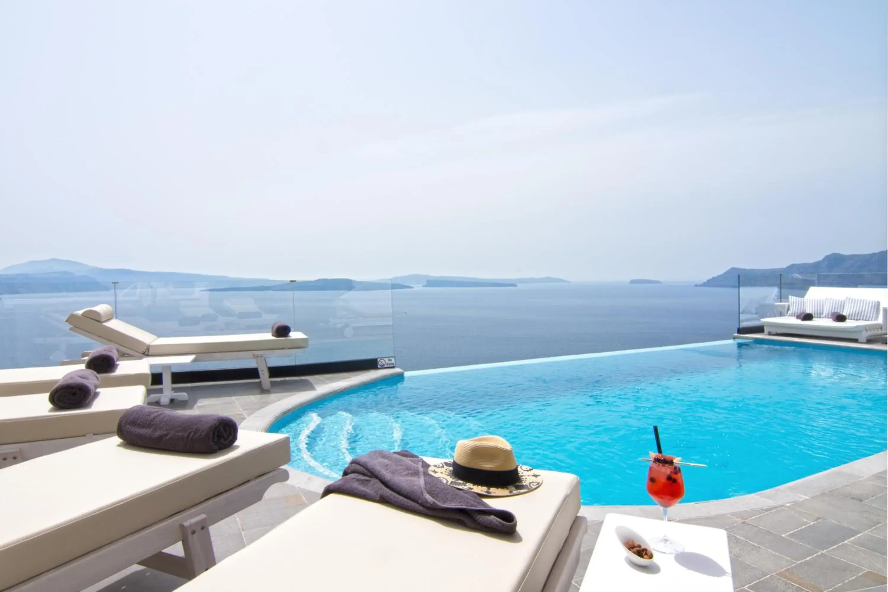 Swimming pool in Santorini Secret Suites & Spa, Small Luxury Hotels of the World Swimming pool in Santorini Secret Suites & Spa, Small Luxury Hotels of the World