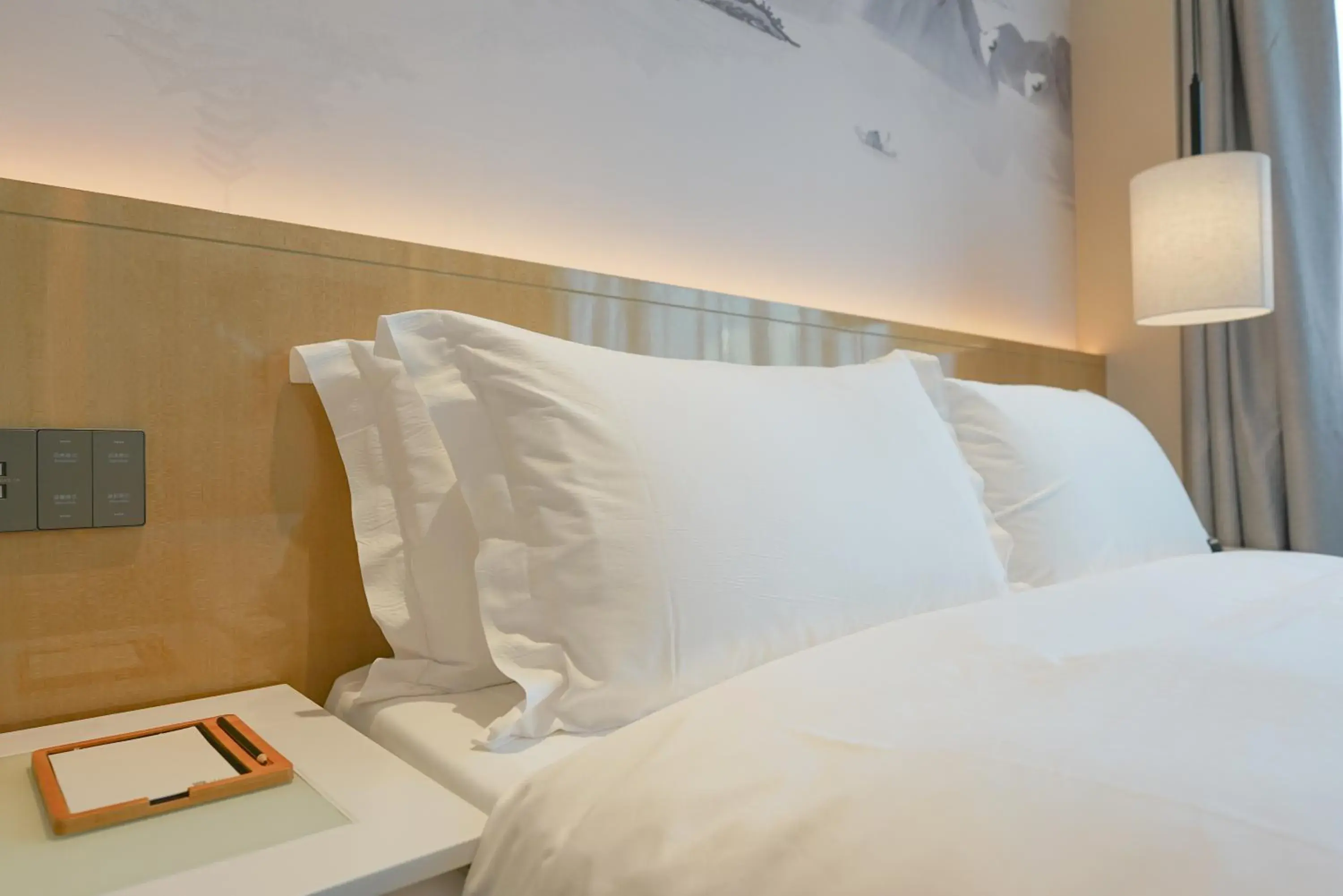 Bed in Paco Hotel Shenzhen Luohu Port Bed in Paco Hotel Shenzhen Luohu Port