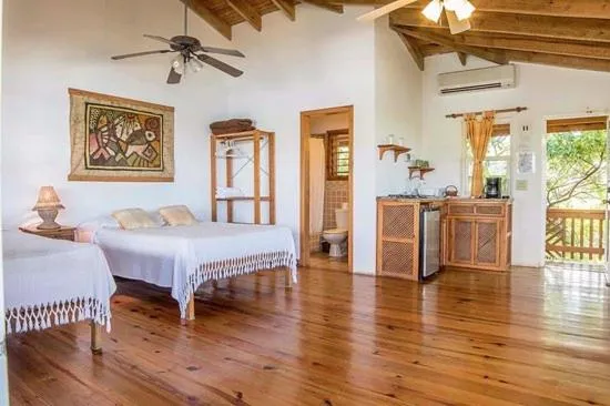 Photo of the whole room, Bed in Hotel Posada Las Orquídeas,West End