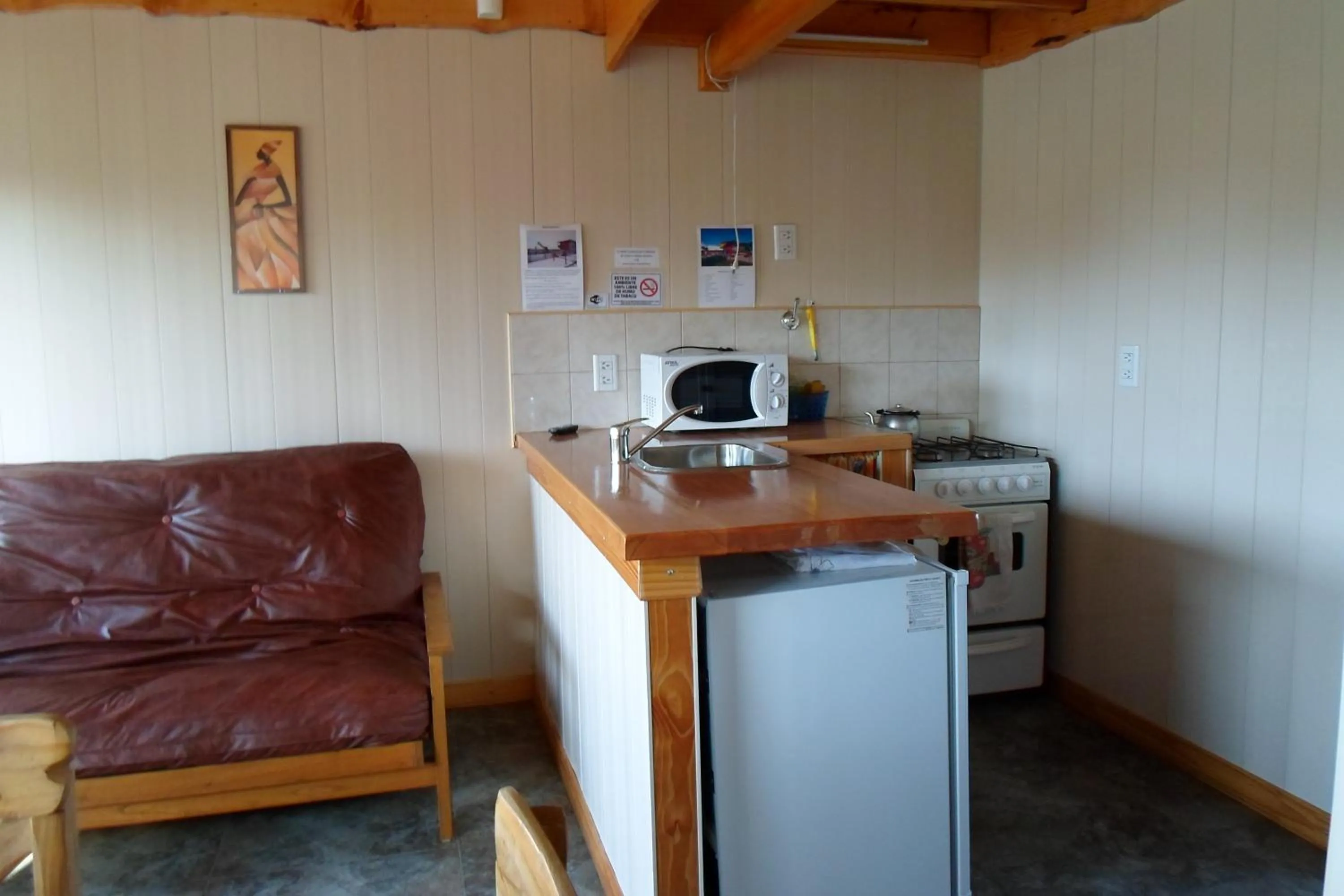 Kitchen or kitchenette in Apart Hotel Curahue