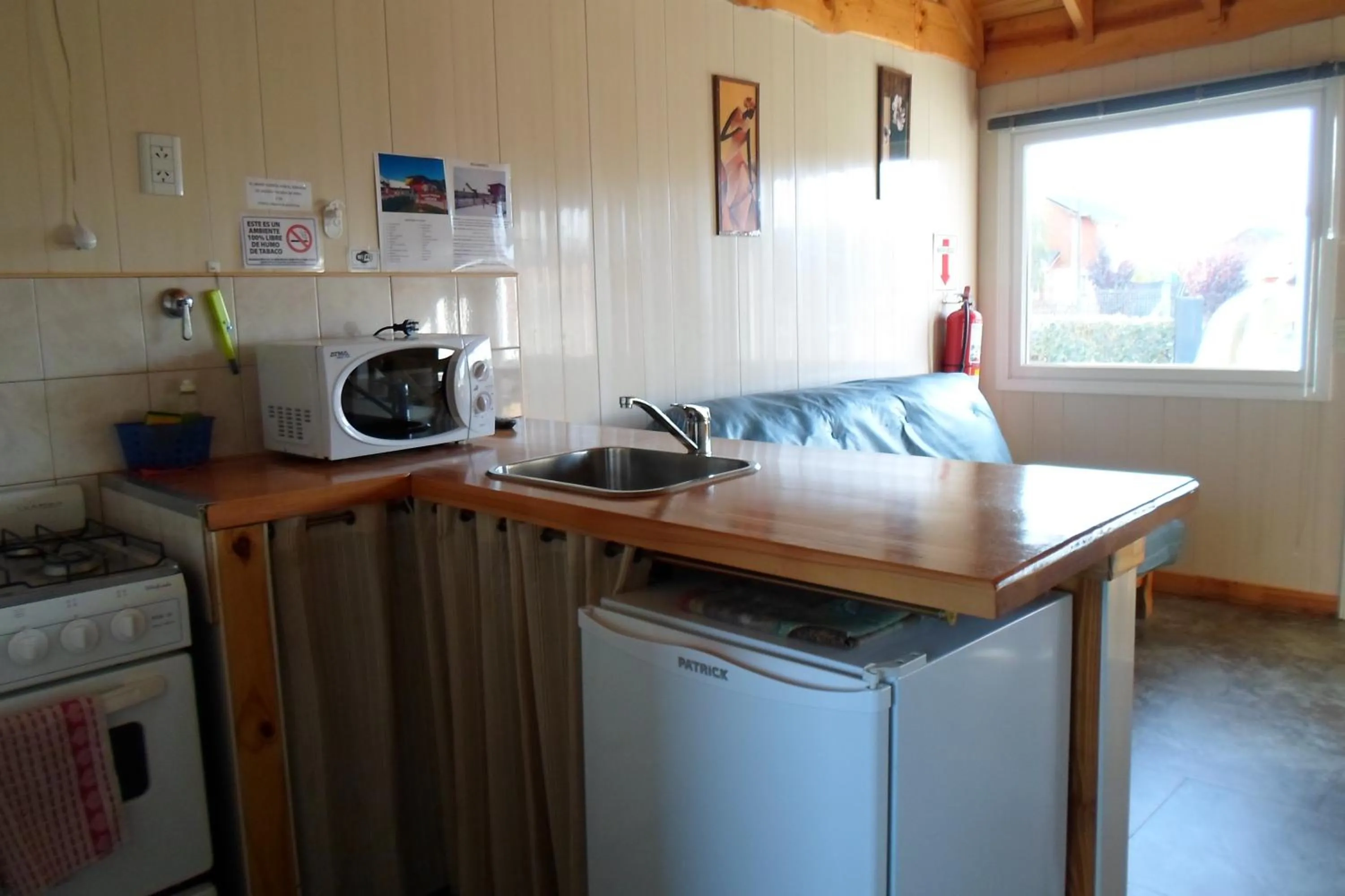 Kitchen or kitchenette in Apart Hotel Curahue
