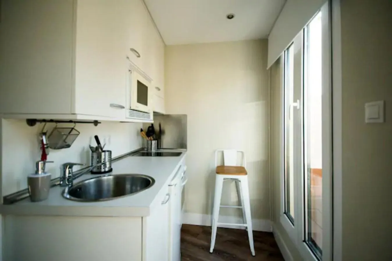 Kitchen or kitchenette in Apartamentos Cruz