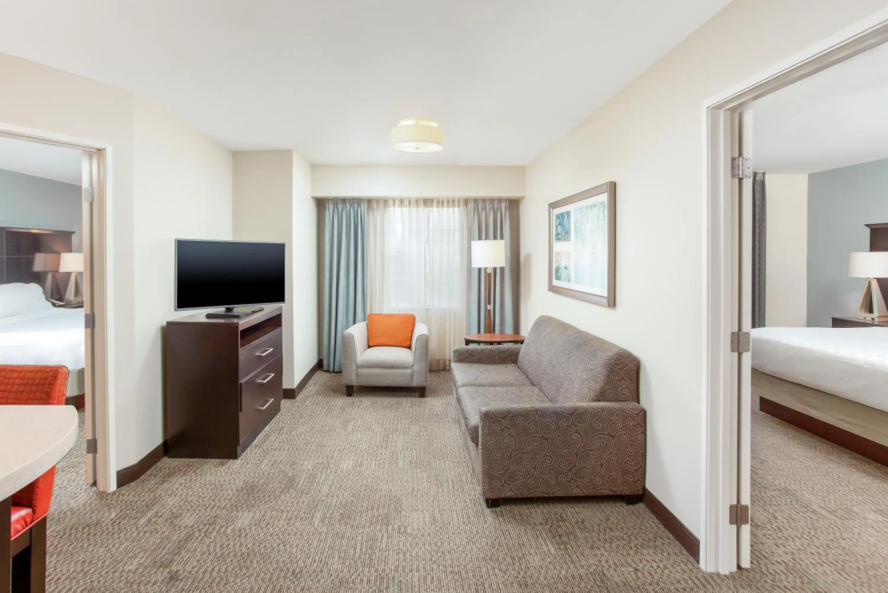 Living room, Bed in Staybridge Suites Chandler by IHG Living room, Bed in Staybridge Suites Chandler by IHG