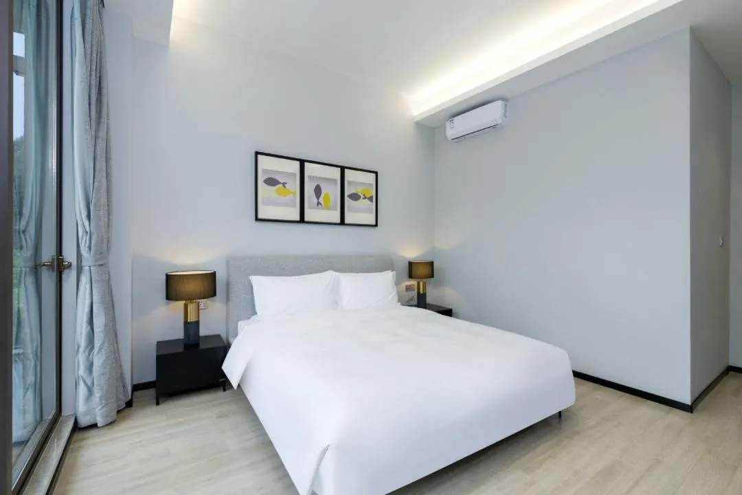 Bed in SongShan Lake PingShang Serviced Hotel