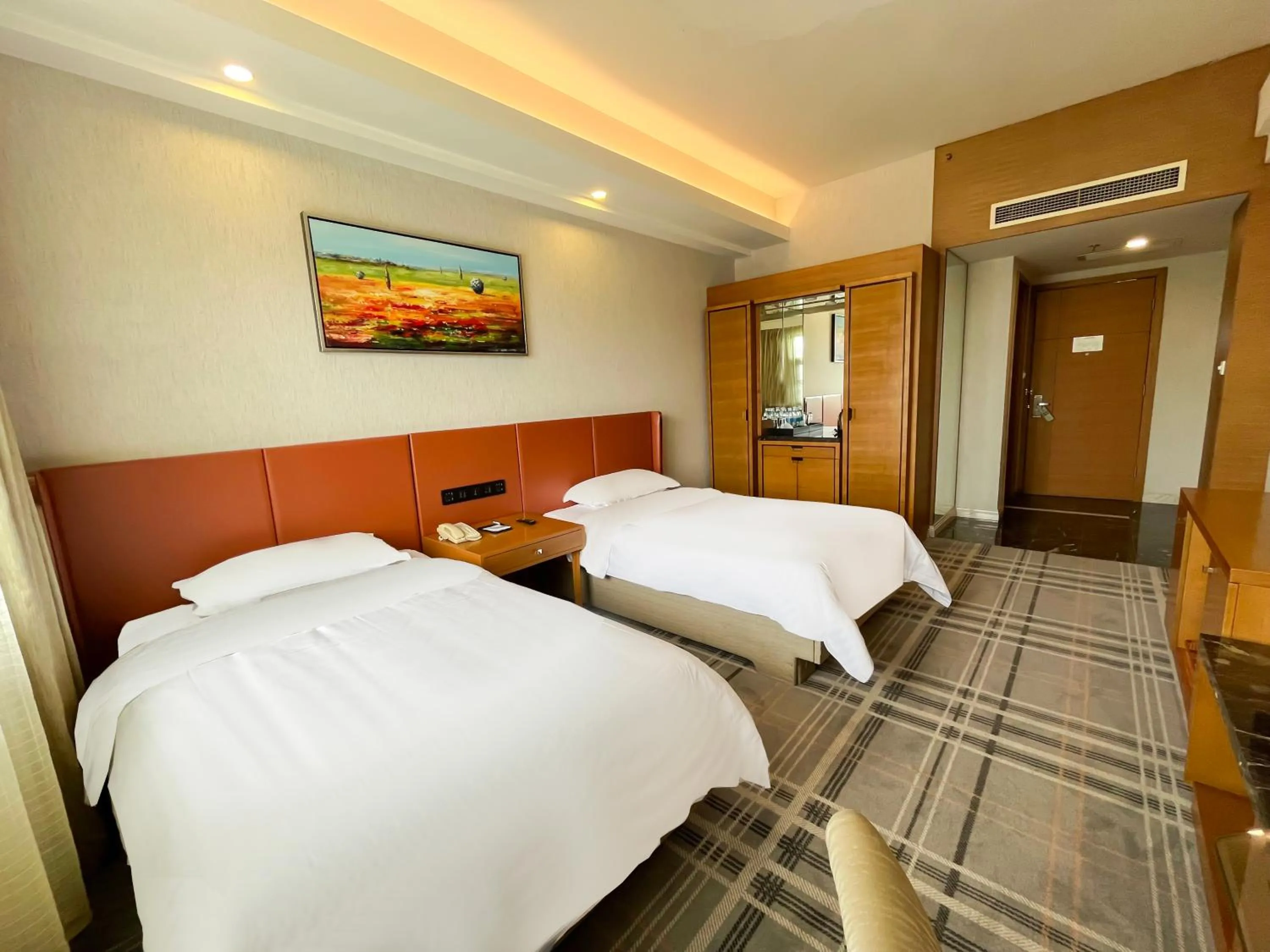 Bed in Jinrui Sunshine Hotel Pengzhou