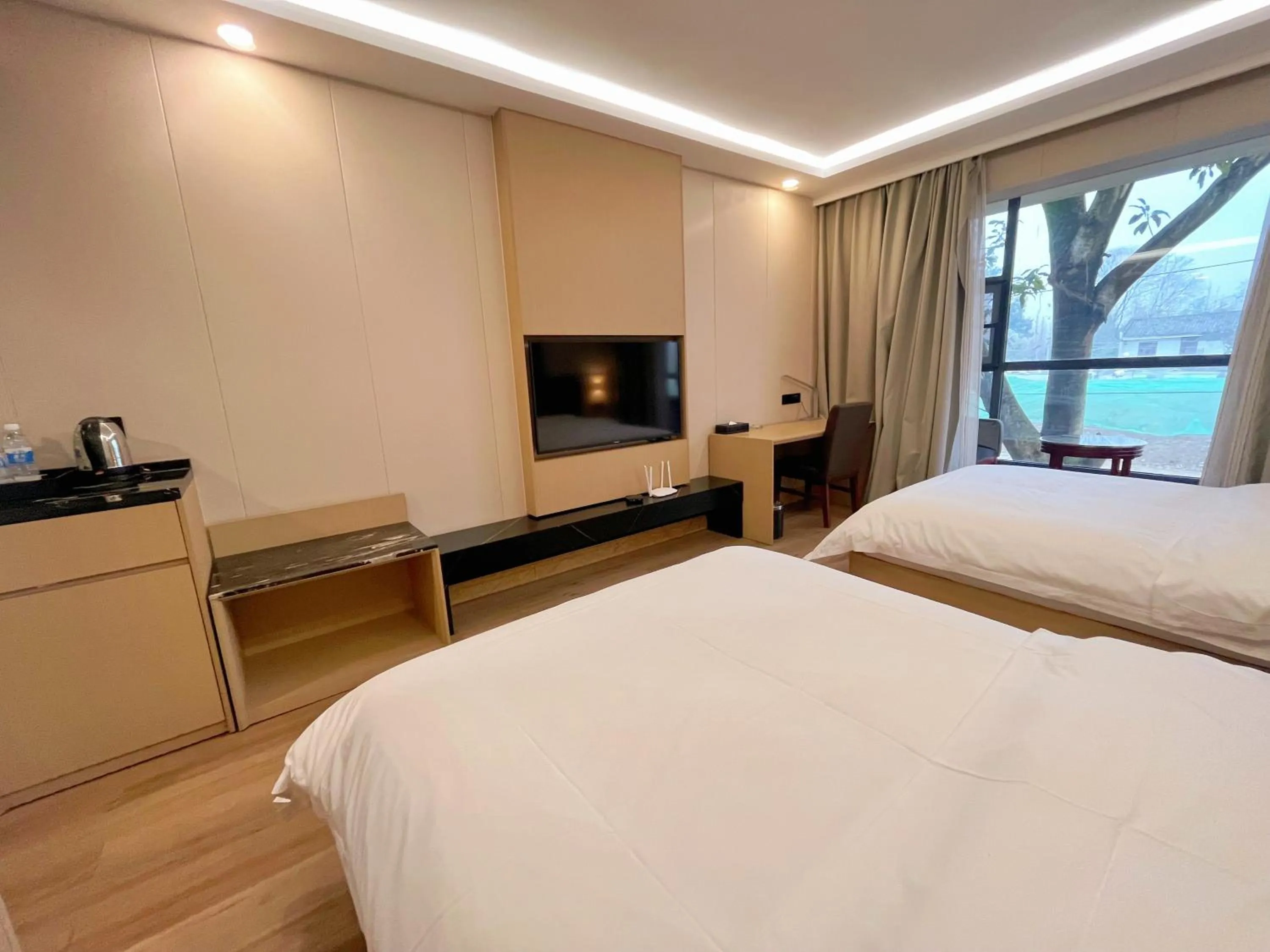 Bed in Jinrui Sunshine Hotel Pengzhou