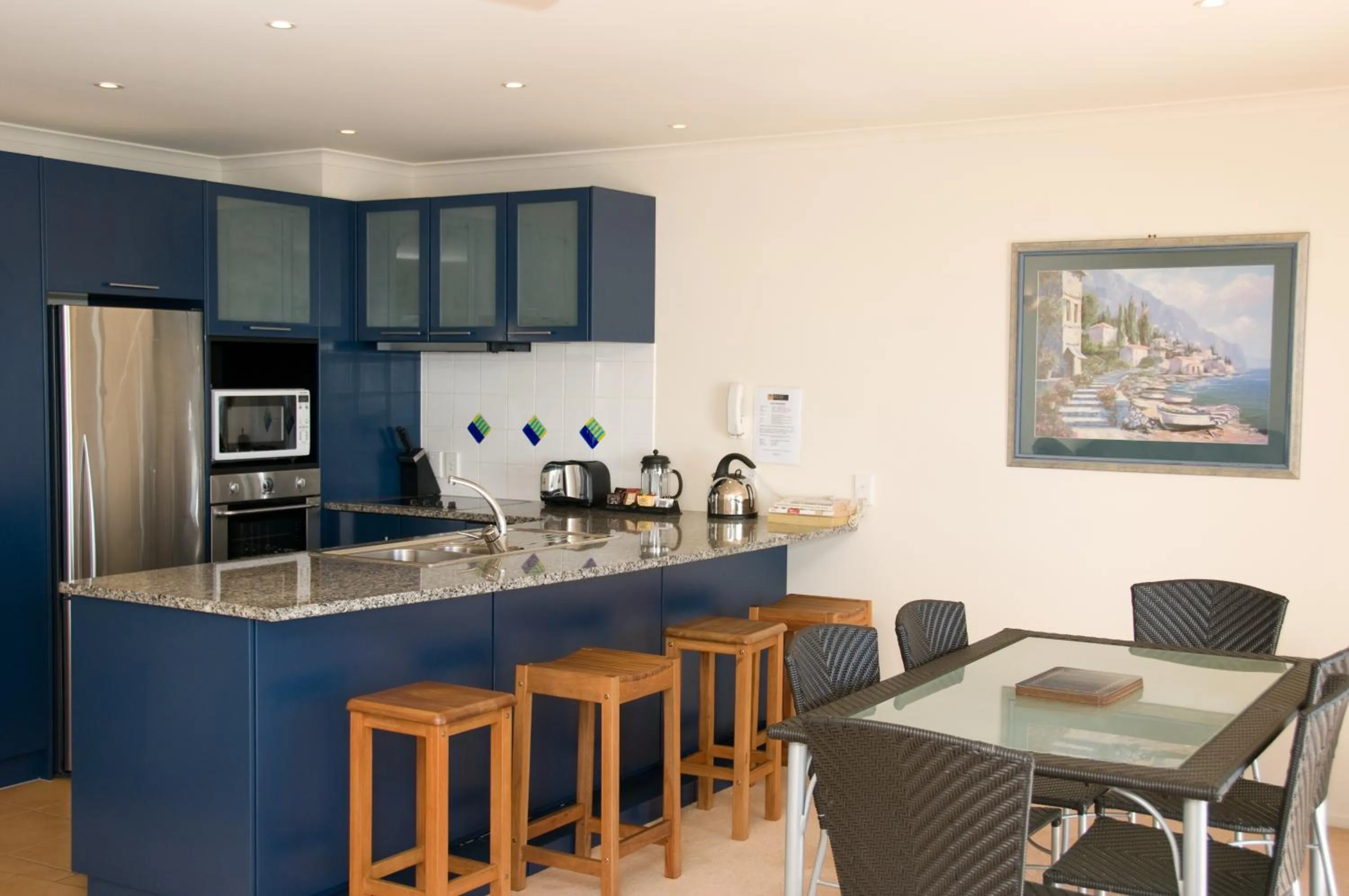 Kitchen or kitchenette in The Reef Beachfront Apartments