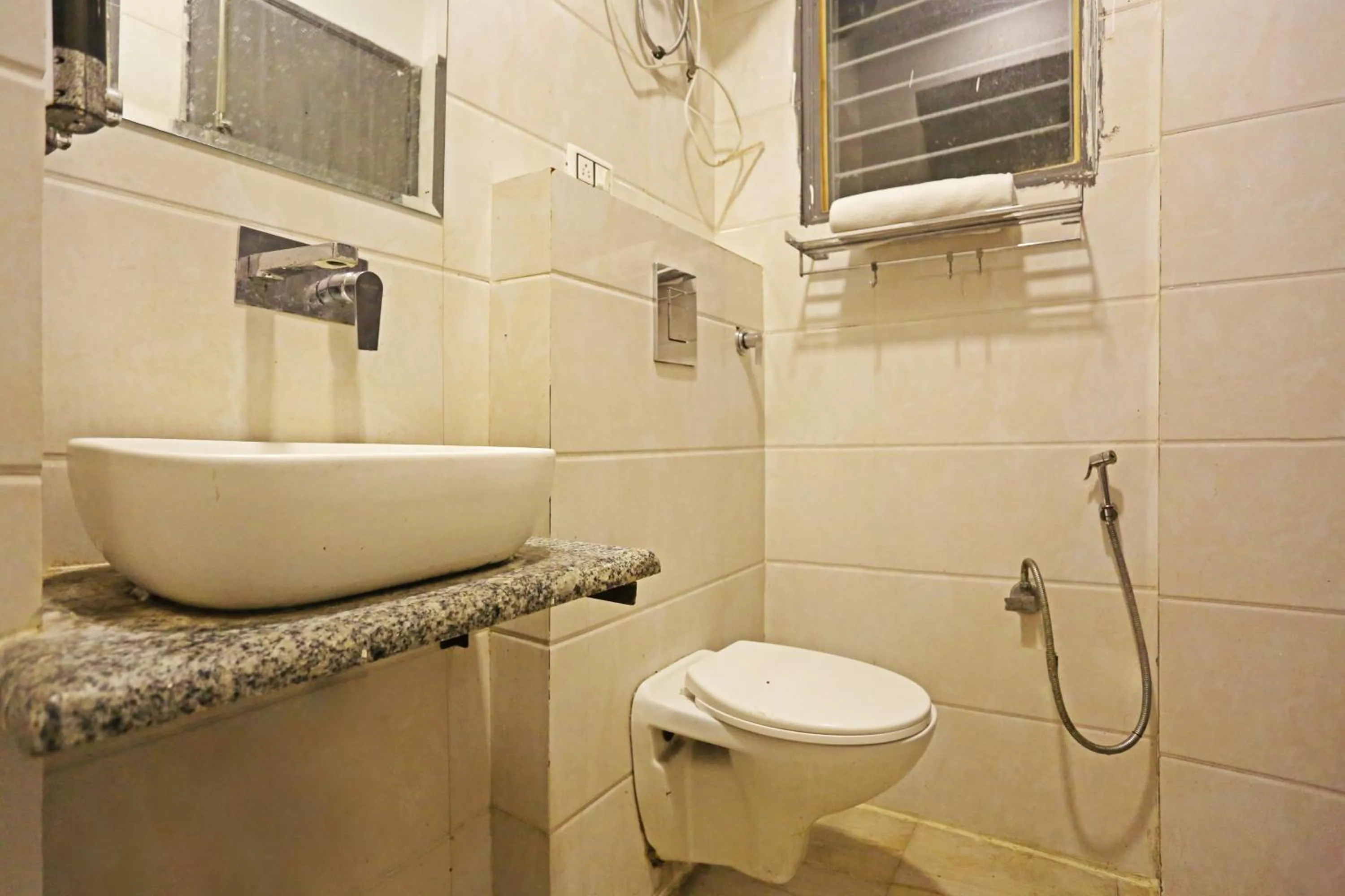 Toilet in Hotel Raaso Inn Rohini Sec-16