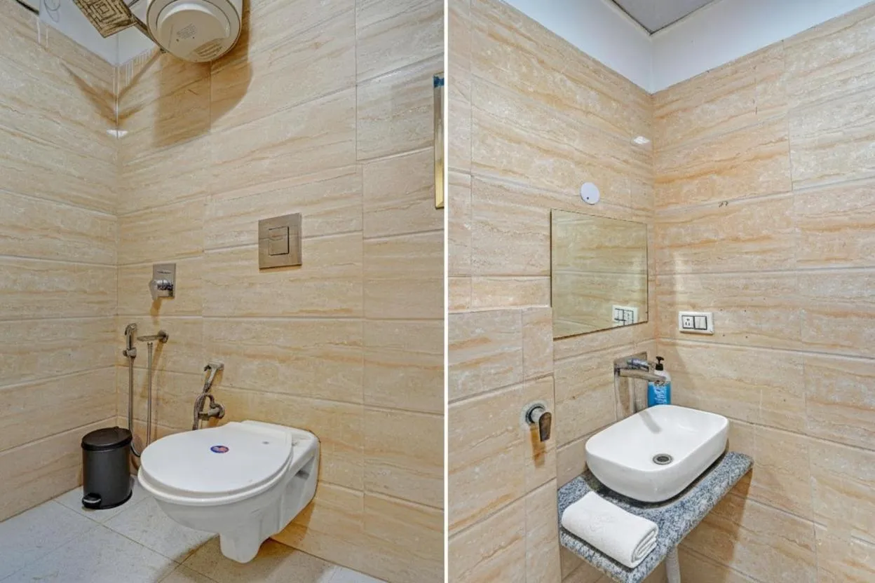Shower in Hotel Raaso Inn Rohini I Near Metro I Couple Friendly I Spacious Rooms I Budget Stay