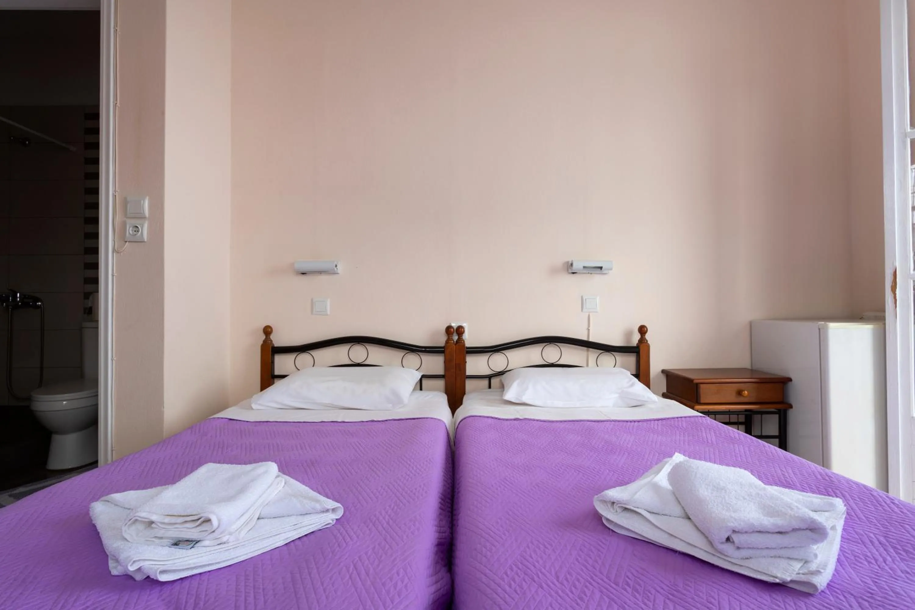 Bed in Stelios Hotel