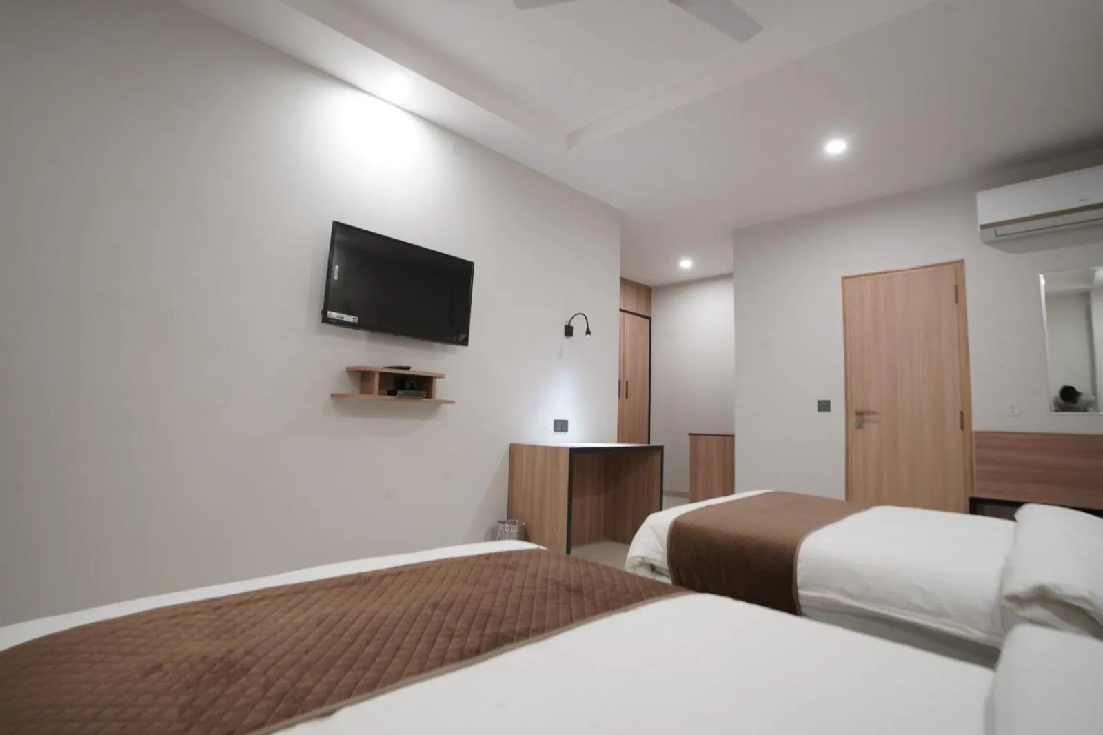 Photo of the whole room, Bed in Hotel Krishna Inn