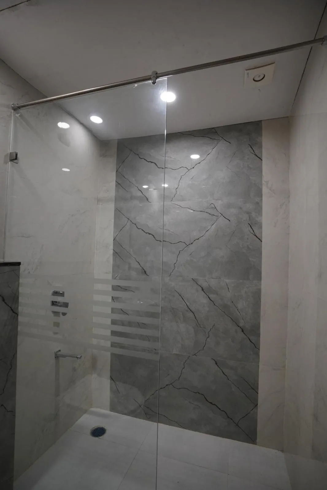 Shower in Hotel Krishna Inn