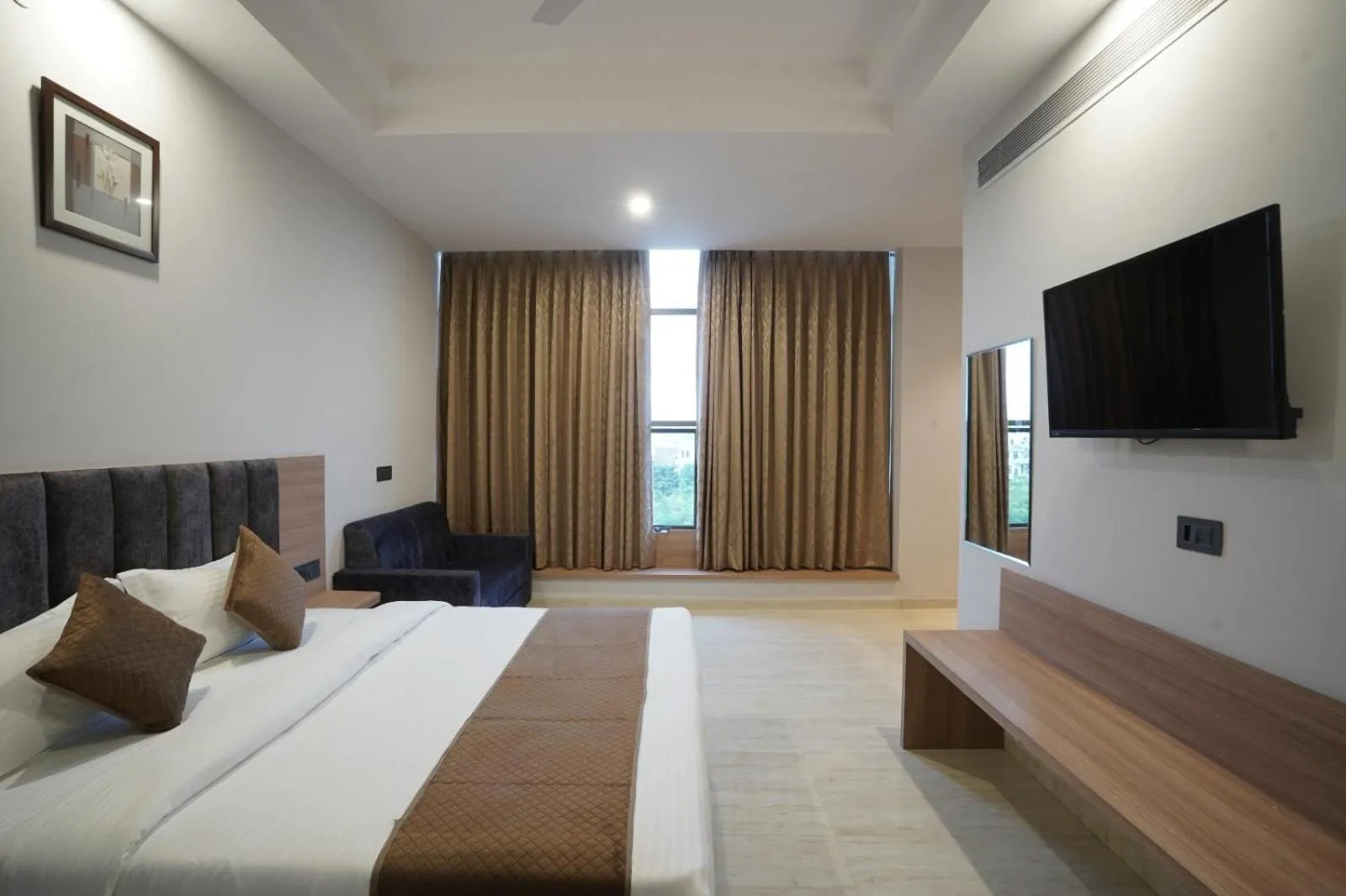 Photo of the whole room, Bed in Hotel Krishna Inn