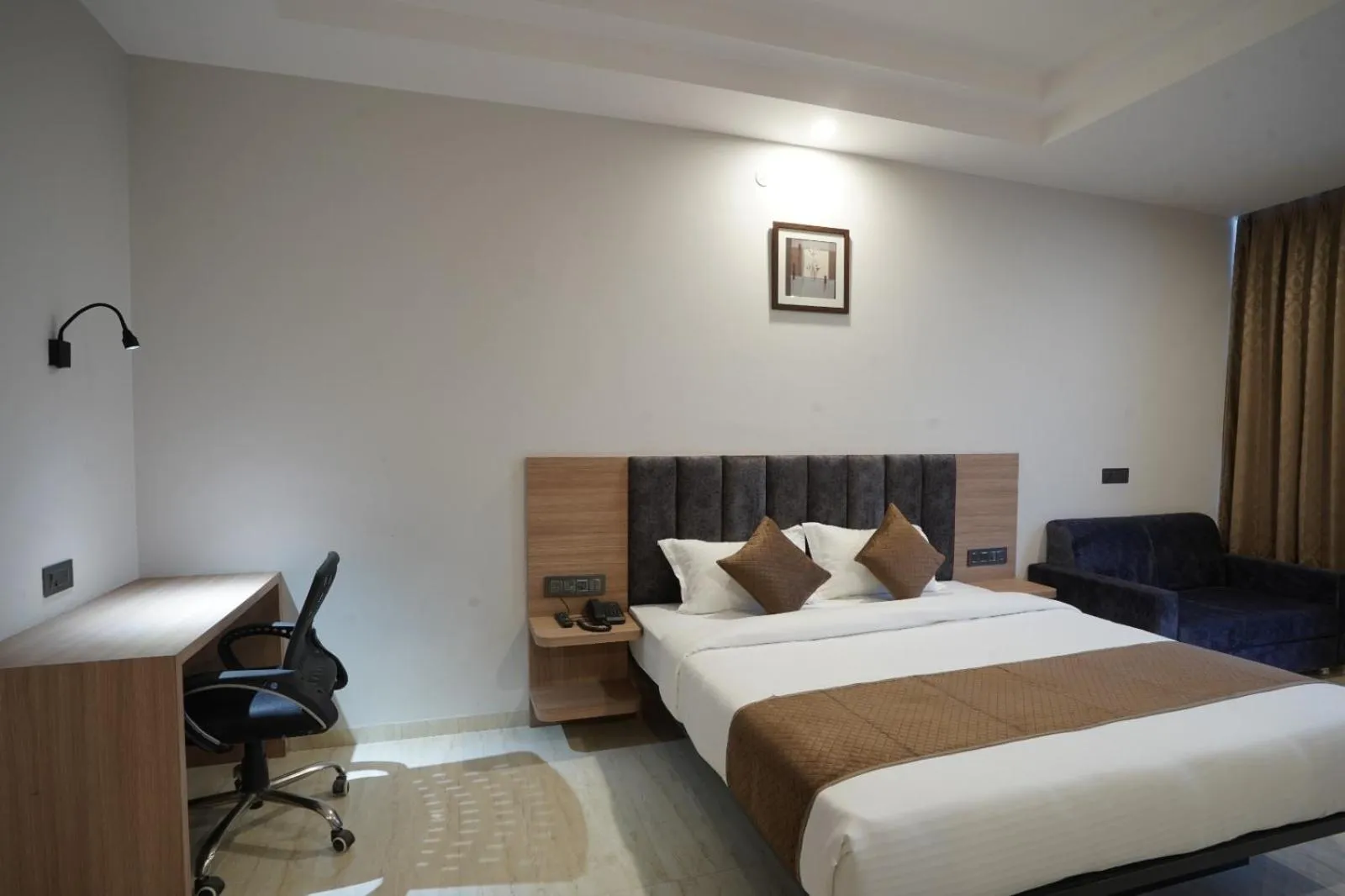 Photo of the whole room, Bed in Hotel Krishna Inn