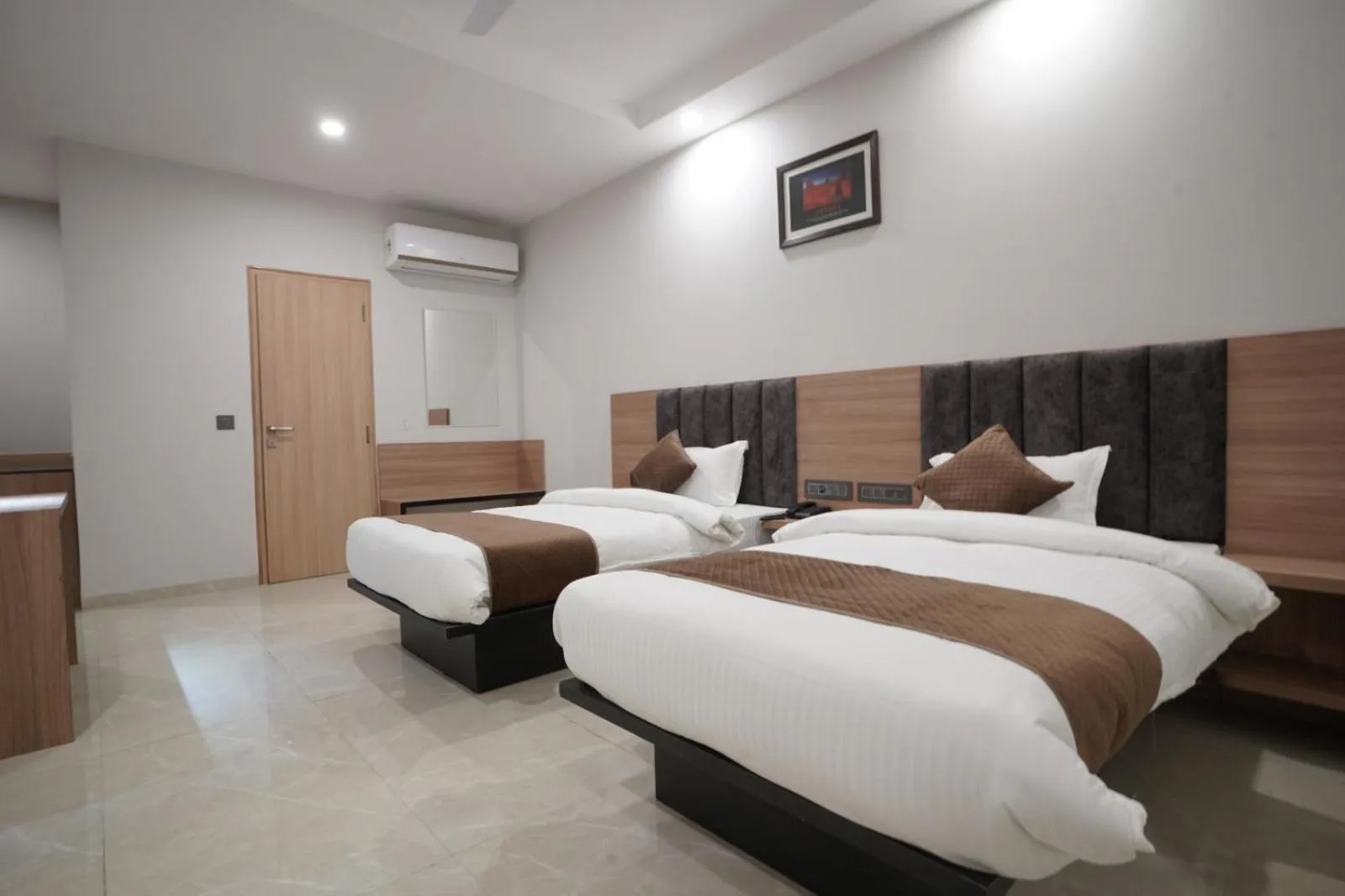 Photo of the whole room, Bed in Hotel Krishna Inn