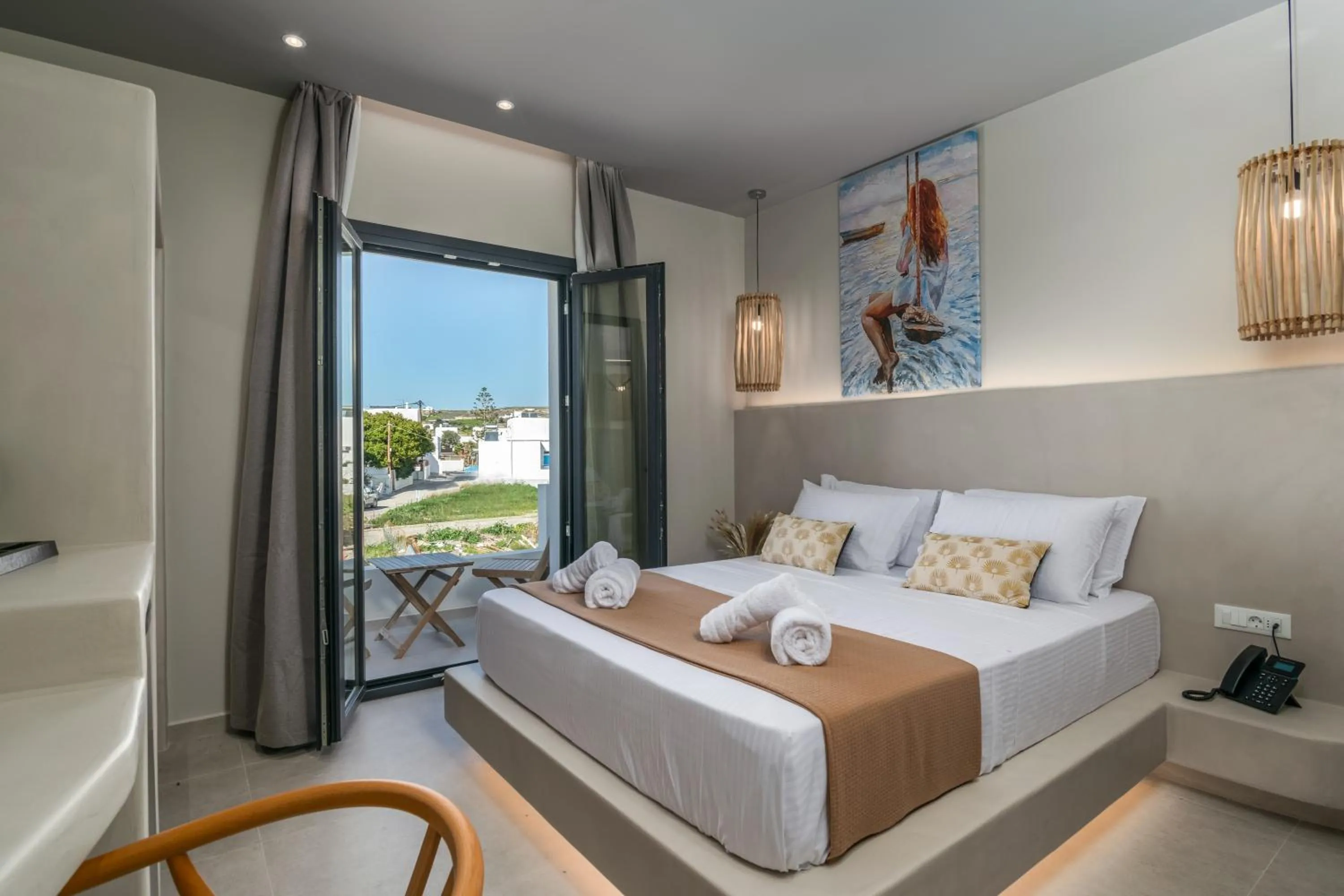 Photo of the whole room, Bed in Afroessa Milos