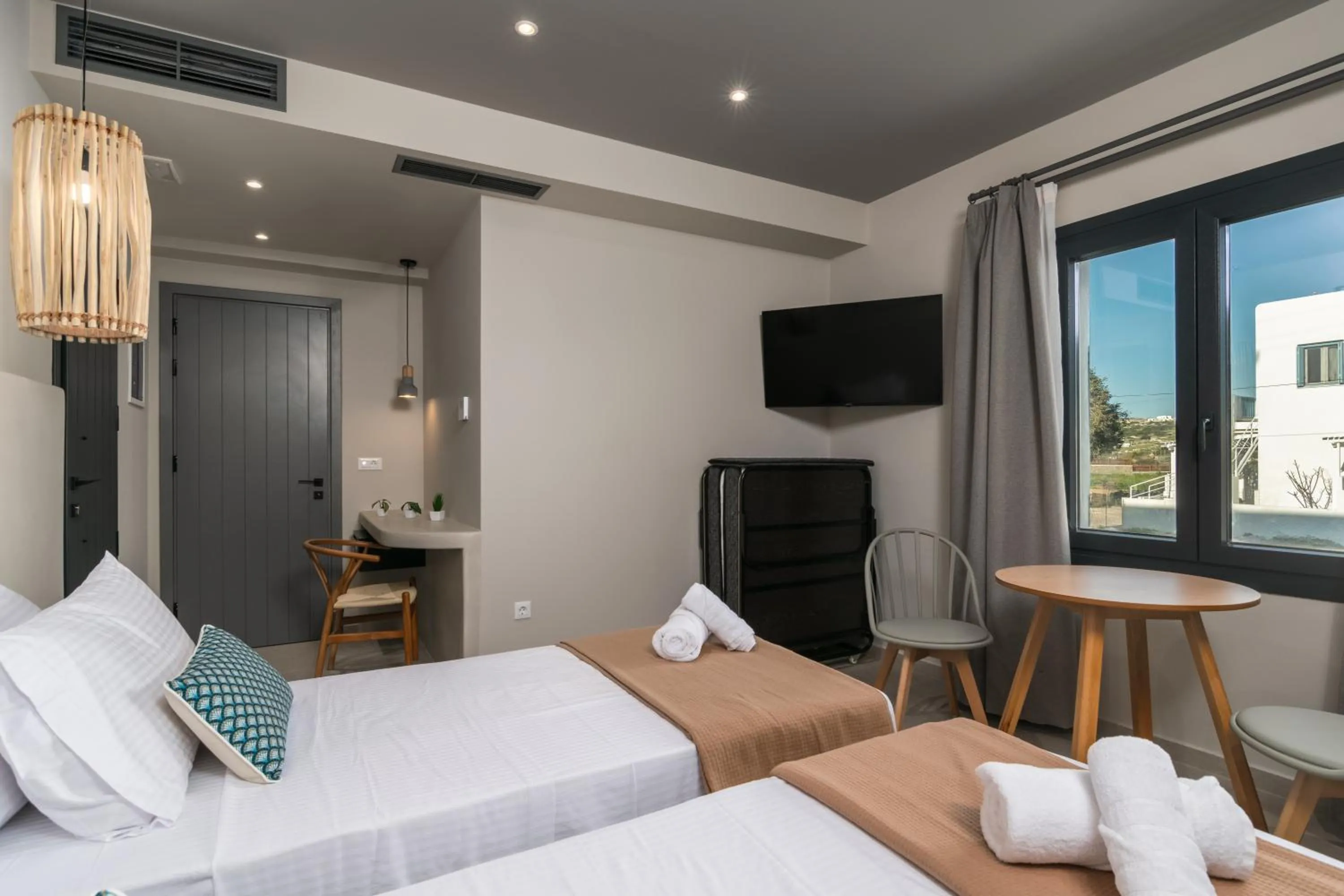 Photo of the whole room, Bed in Afroessa Milos