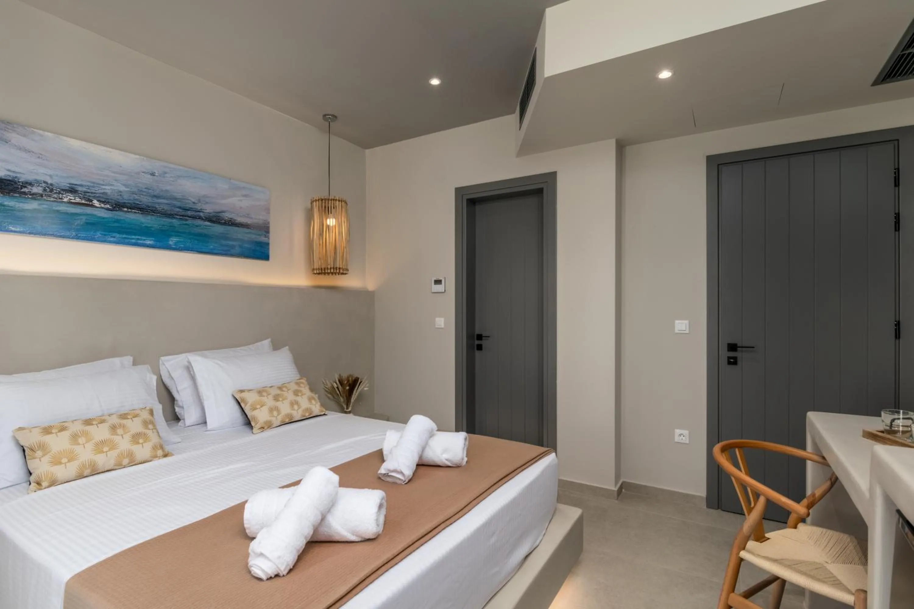 Photo of the whole room, Bed in Afroessa Milos