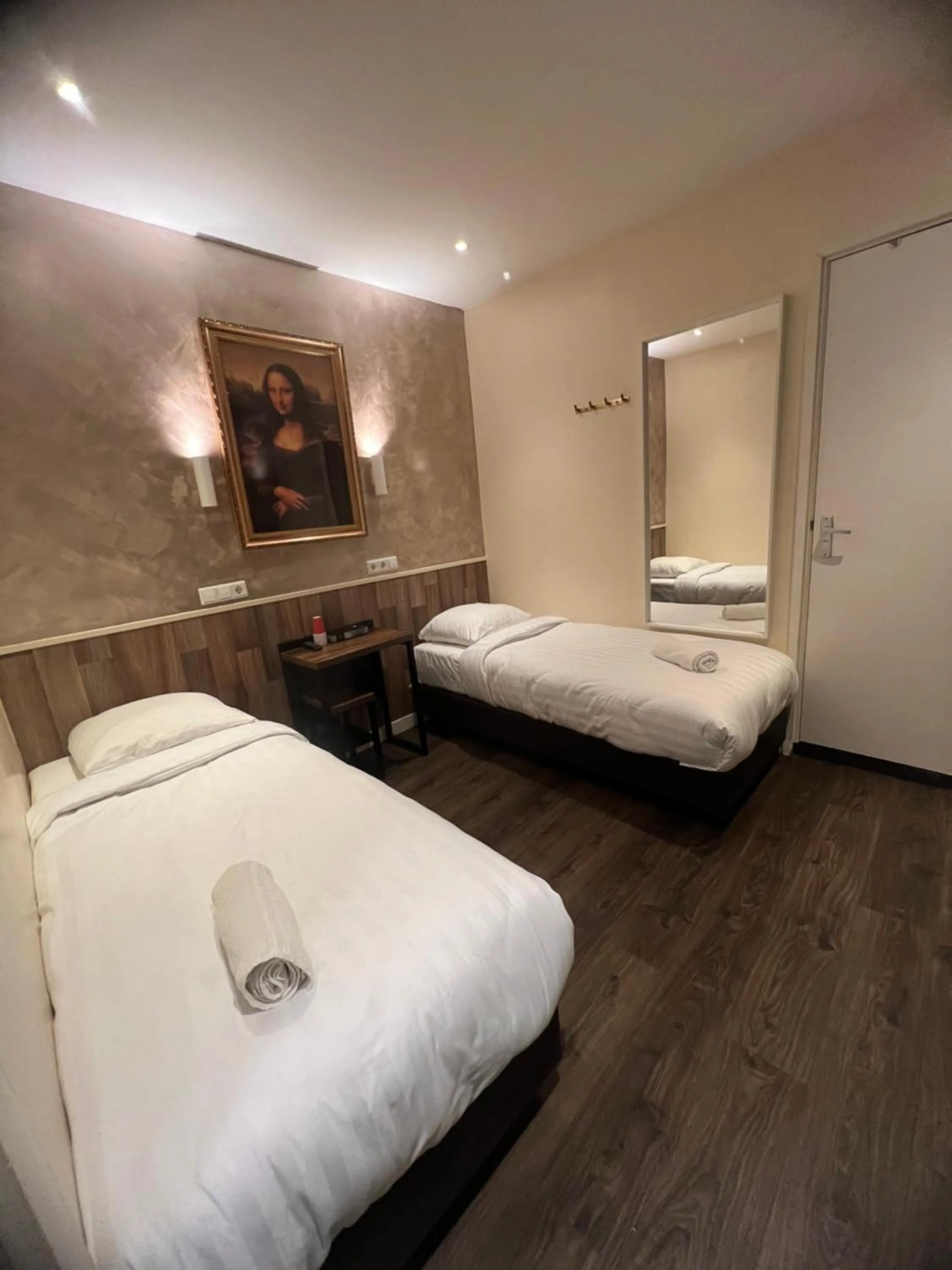 Bed in Orange Tulip Hotel