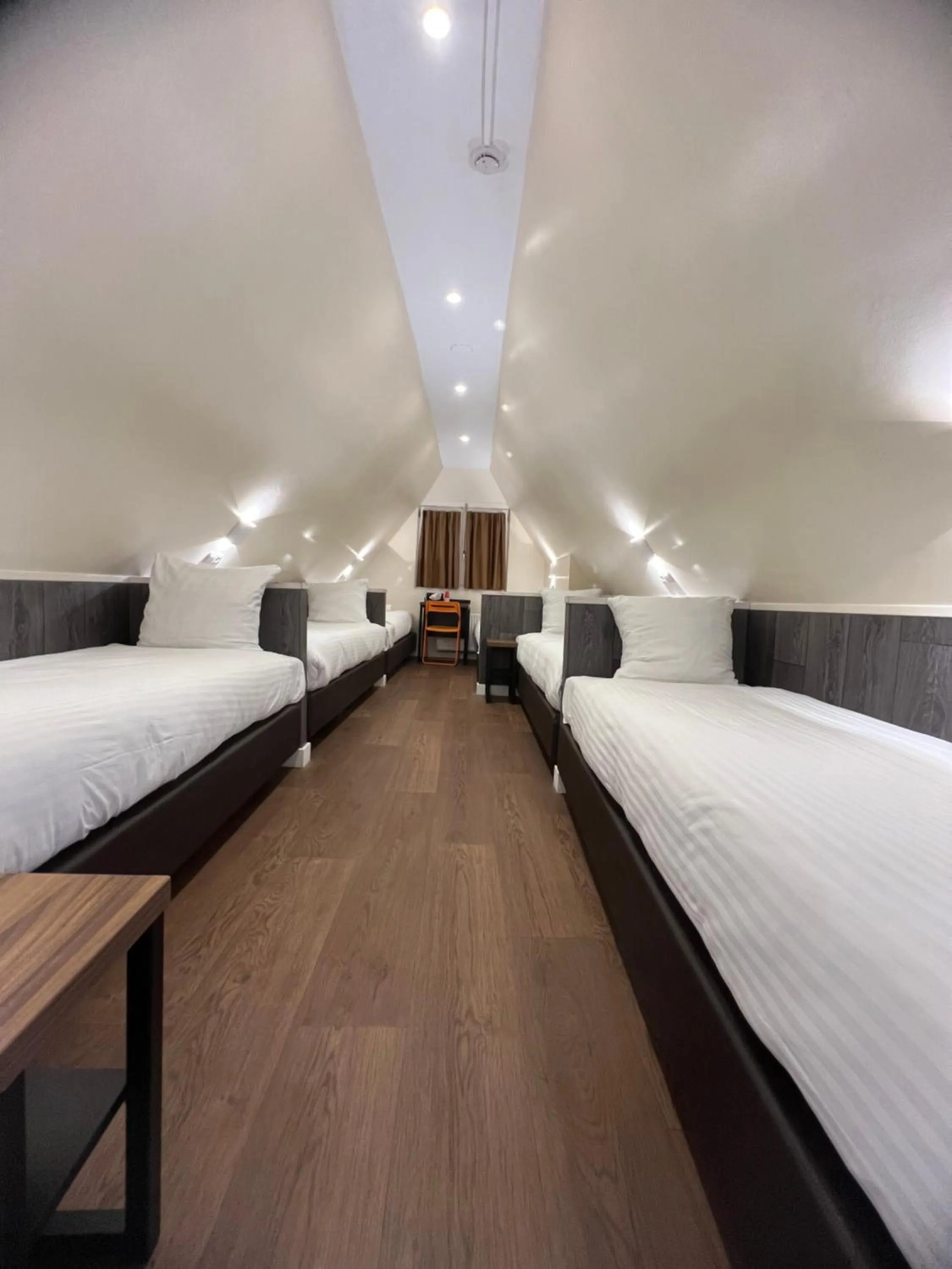 Bed in Orange Tulip Hotel