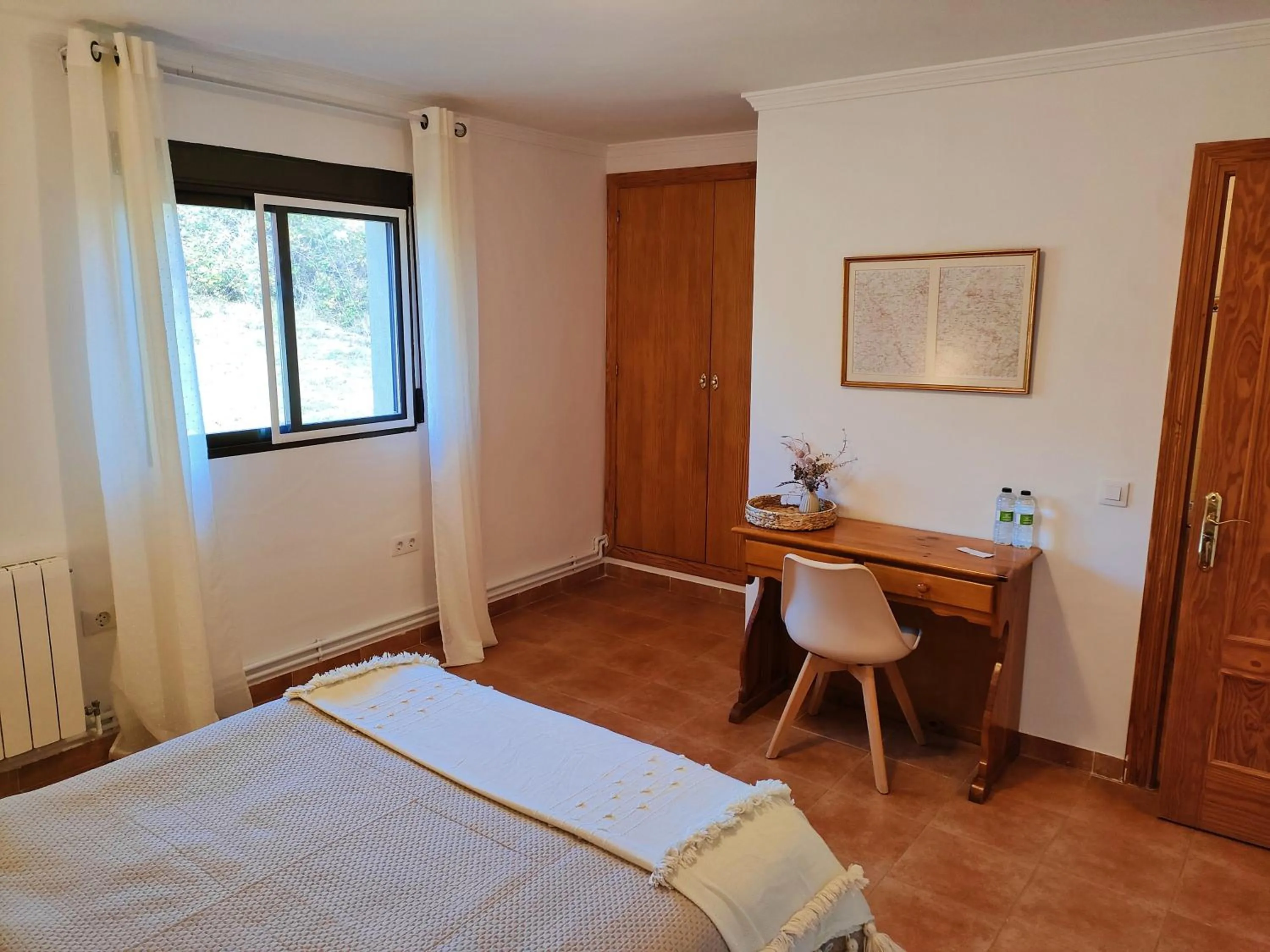 Photo of the whole room, Bed in Hostal Mirall Rural