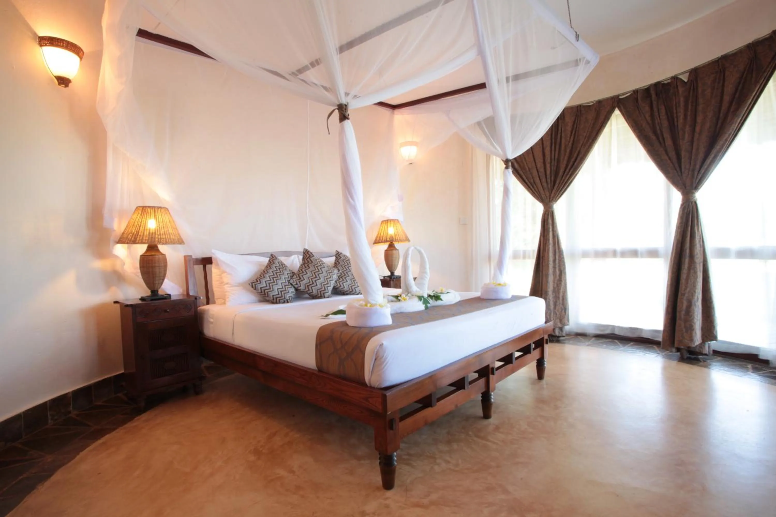 Bedroom in Ocean Paradise Resort & Spa