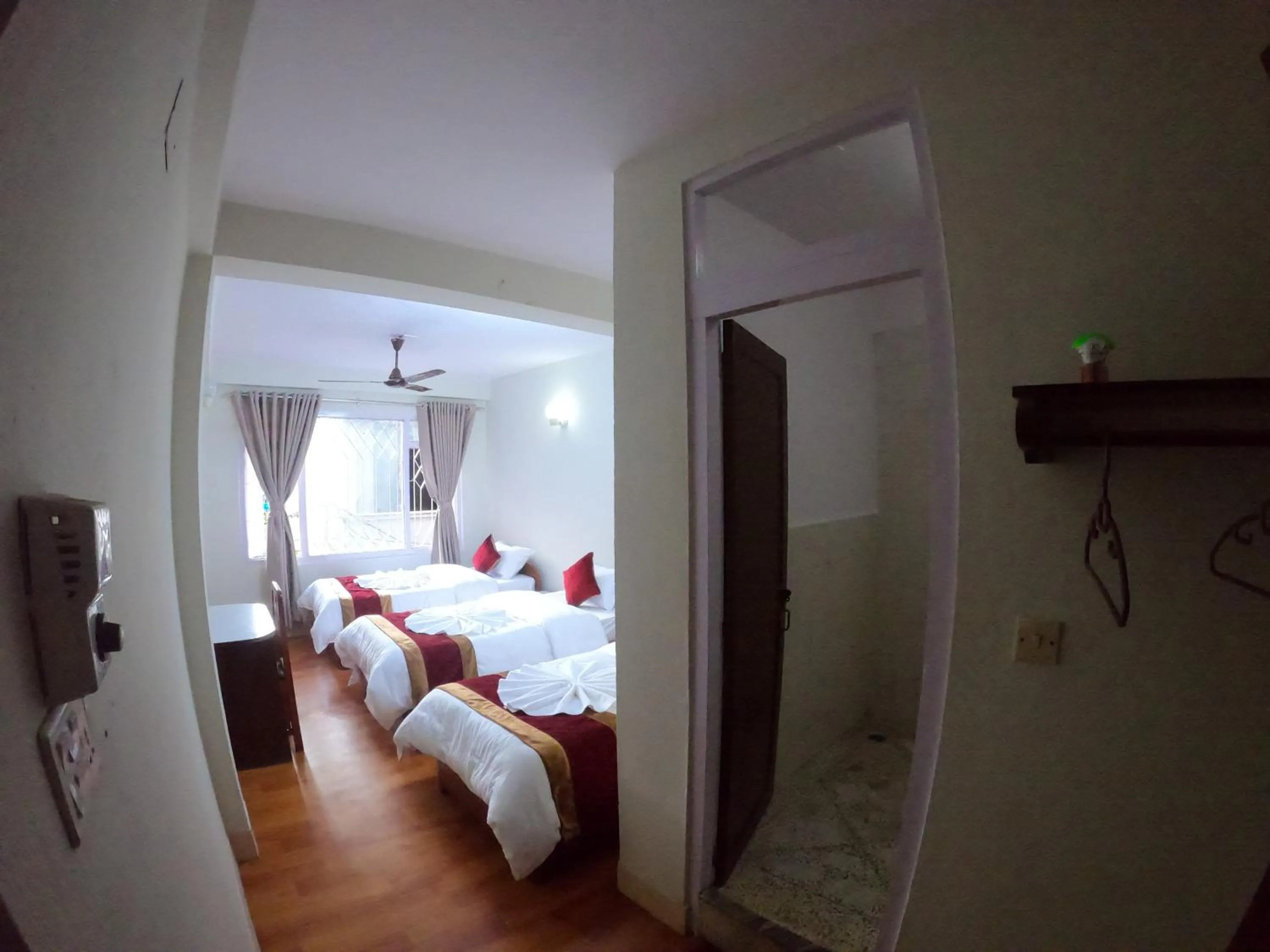 Photo of the whole room, Bed in Om Tara Guest House Pvt Ltd