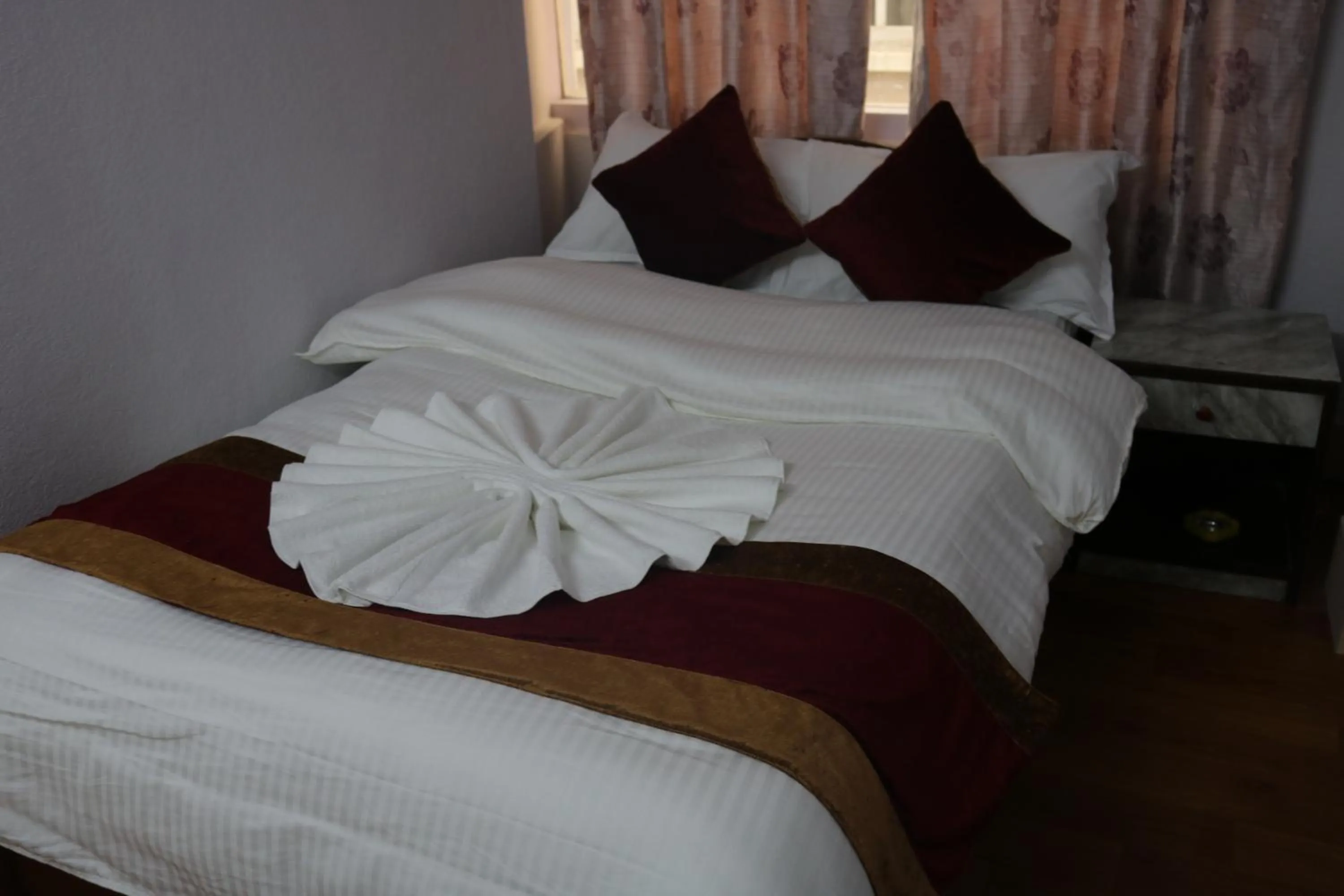 Bed in Om Tara Guest House Pvt Ltd