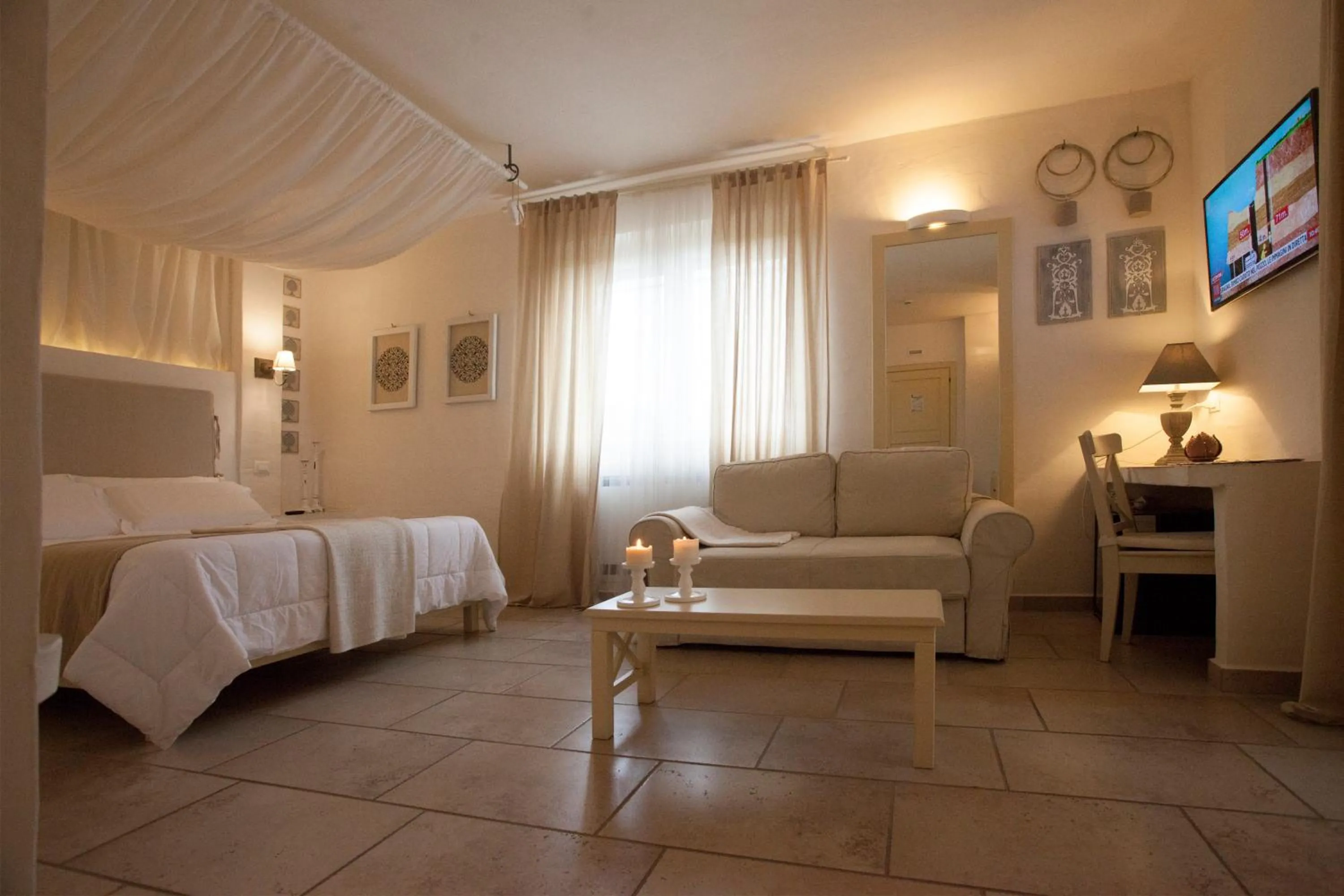 Deluxe Quadruple Room with Private Terrace - single occupancy in Relais in Contrada