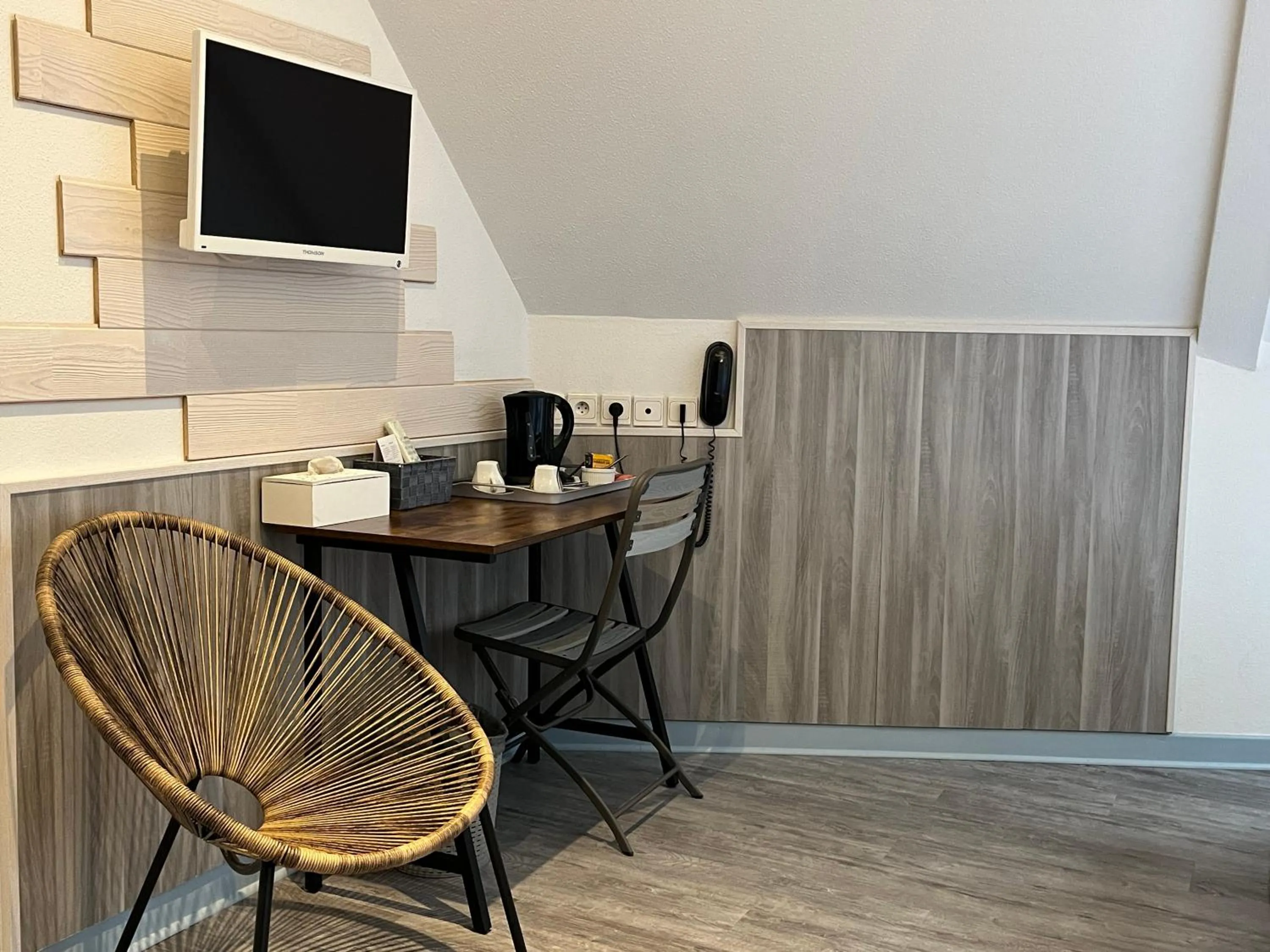 Bedroom in Hôtel Le Lacuzon