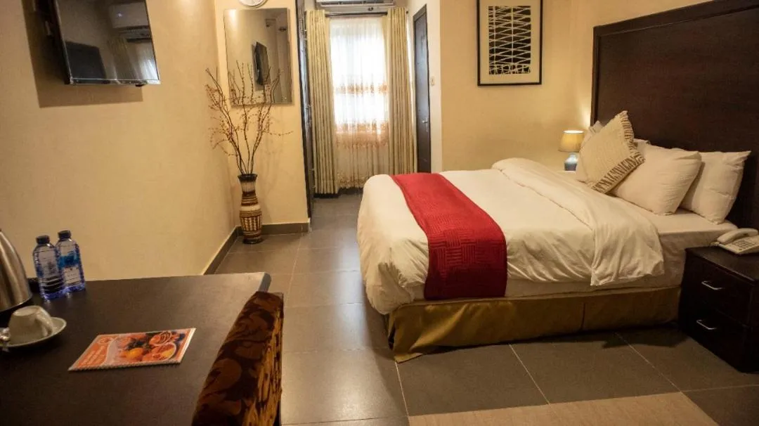 Bed in SSNIT GUEST HOUSE