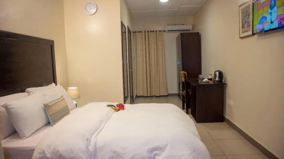 Bed in SSNIT GUEST HOUSE