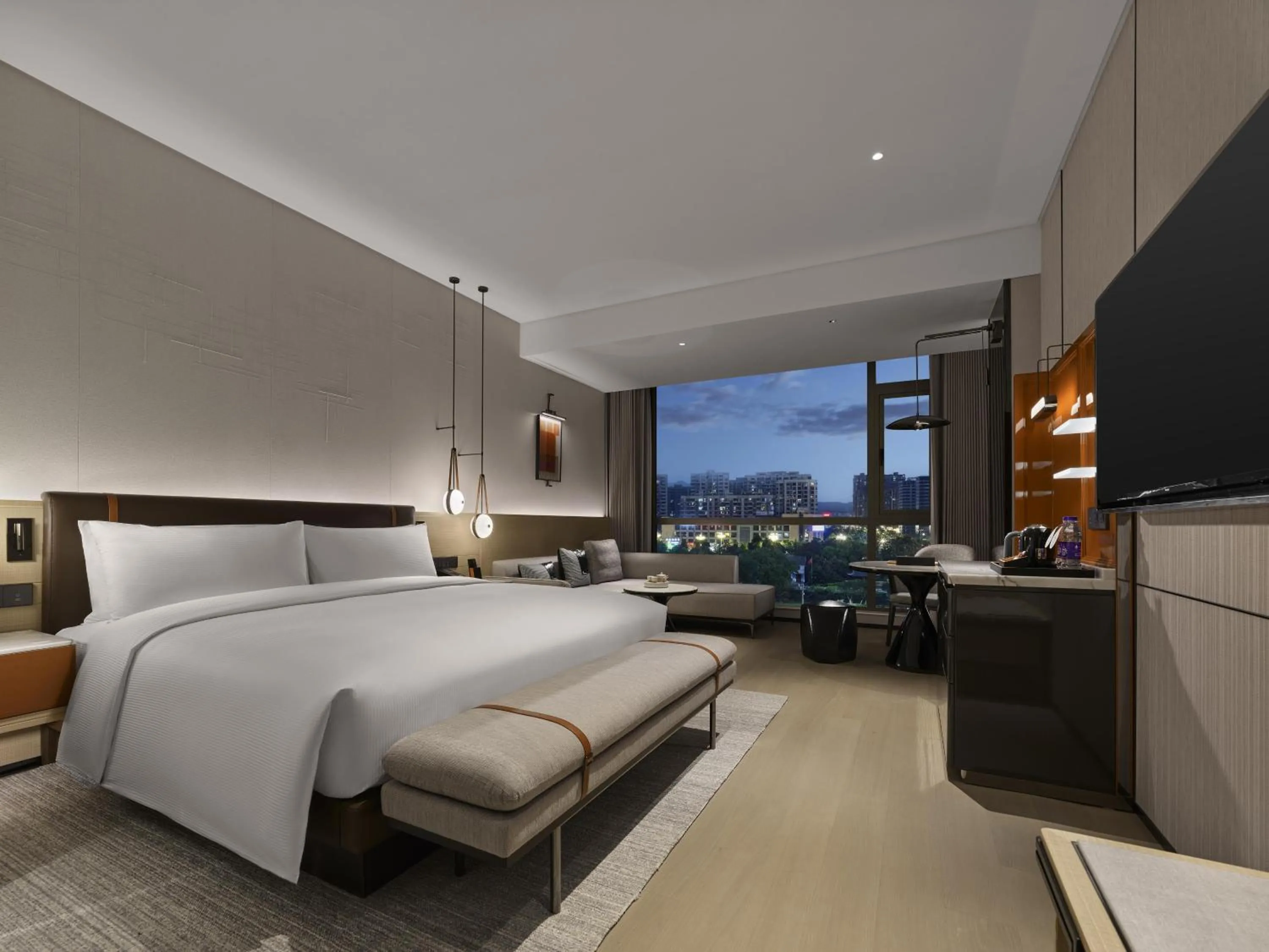 Bed in DoubleTree By Hilton Cangnan