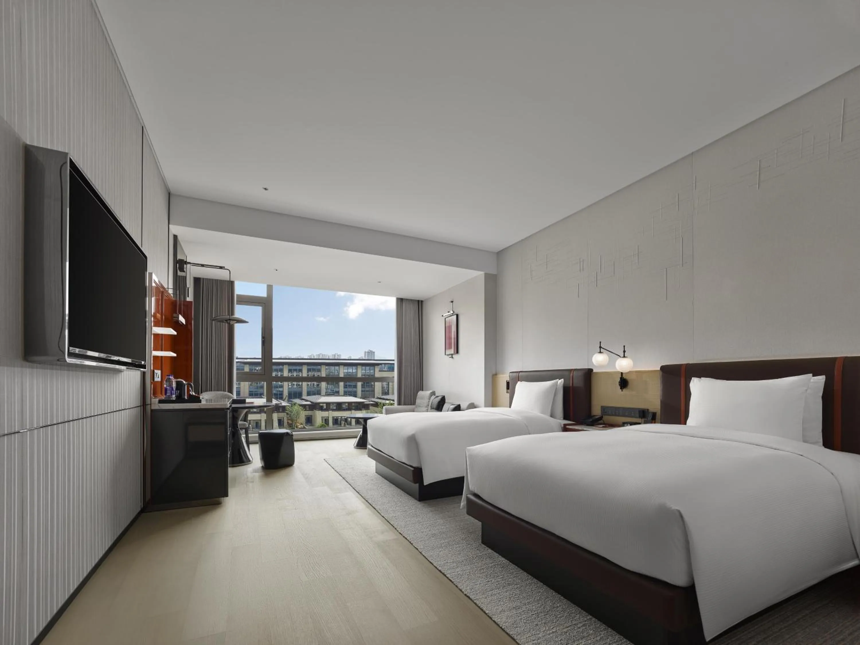 Bed in DoubleTree By Hilton Cangnan