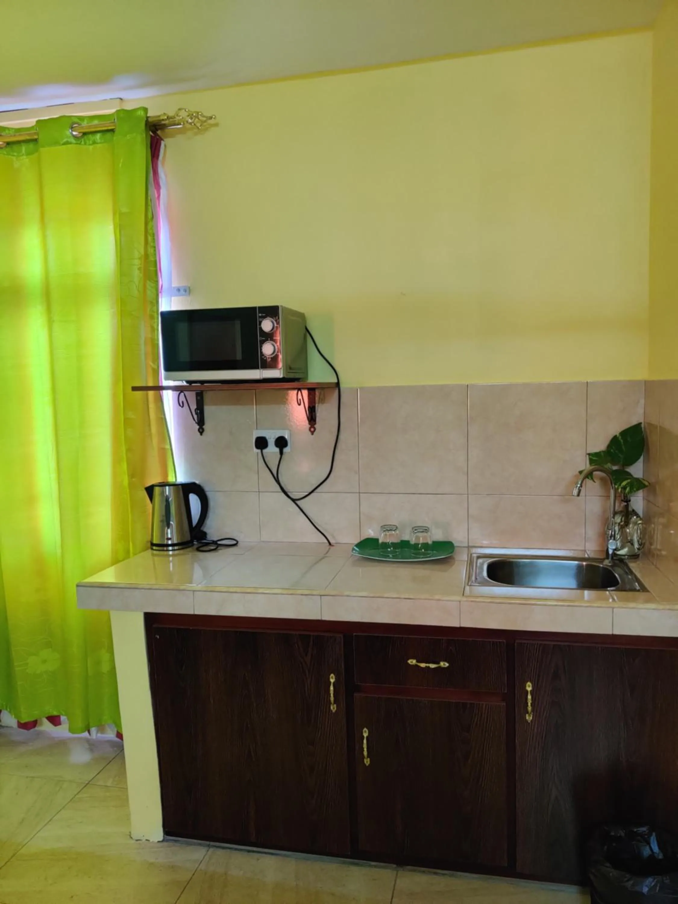 Kitchen or kitchenette in Bob Apartments