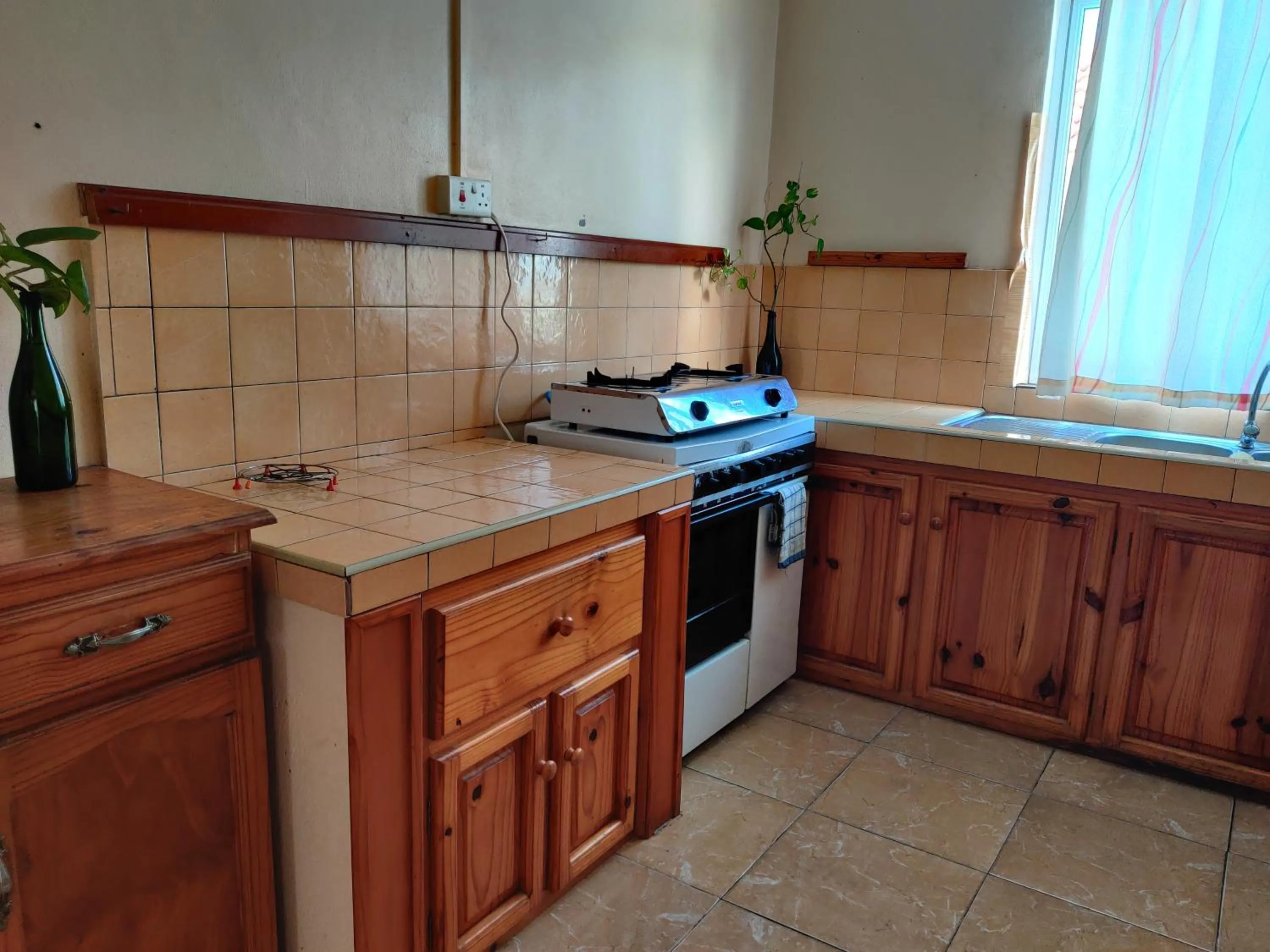 Kitchen or kitchenette in Bob Apartments