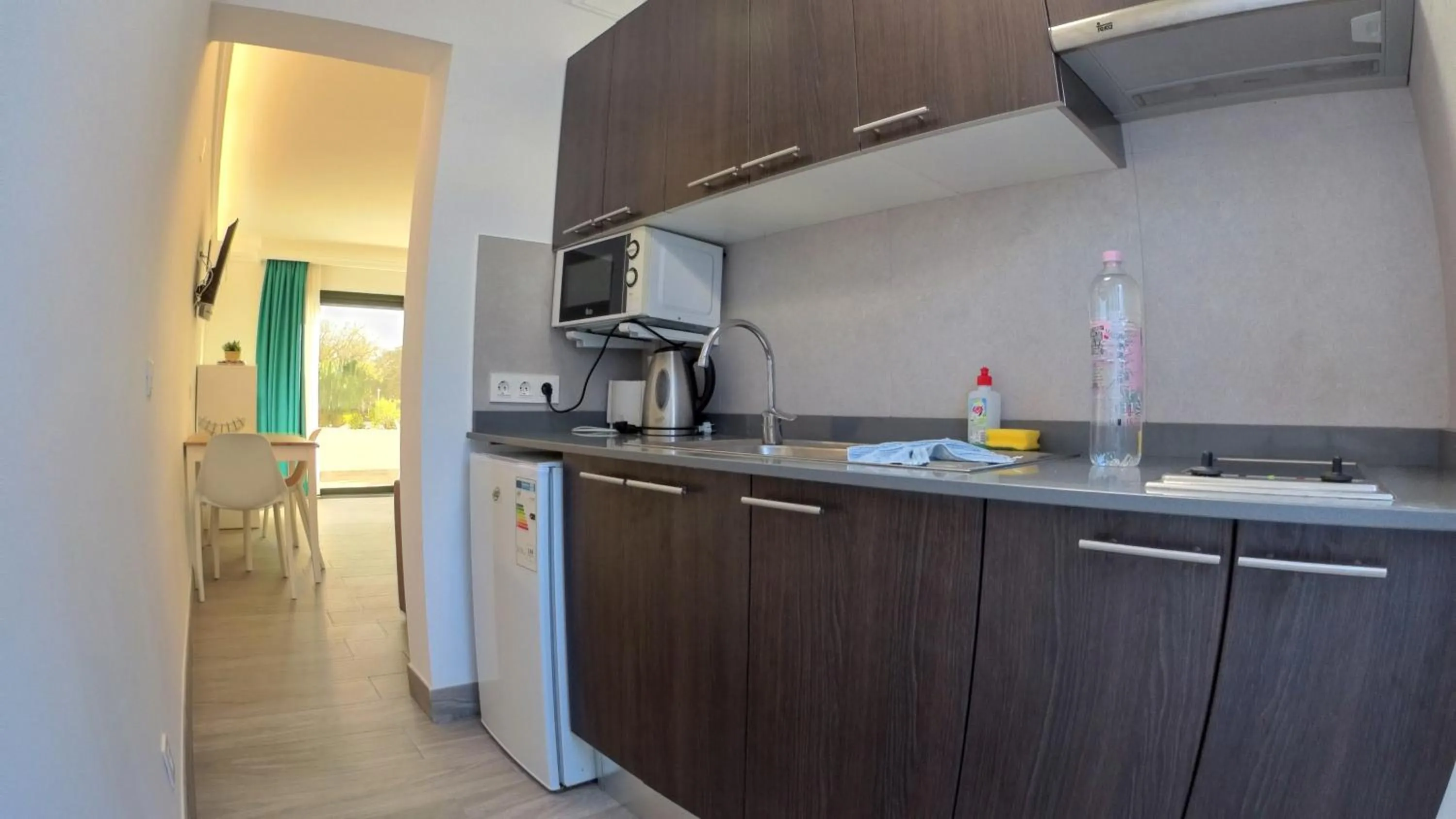 Kitchen or kitchenette in Palmeras Garden